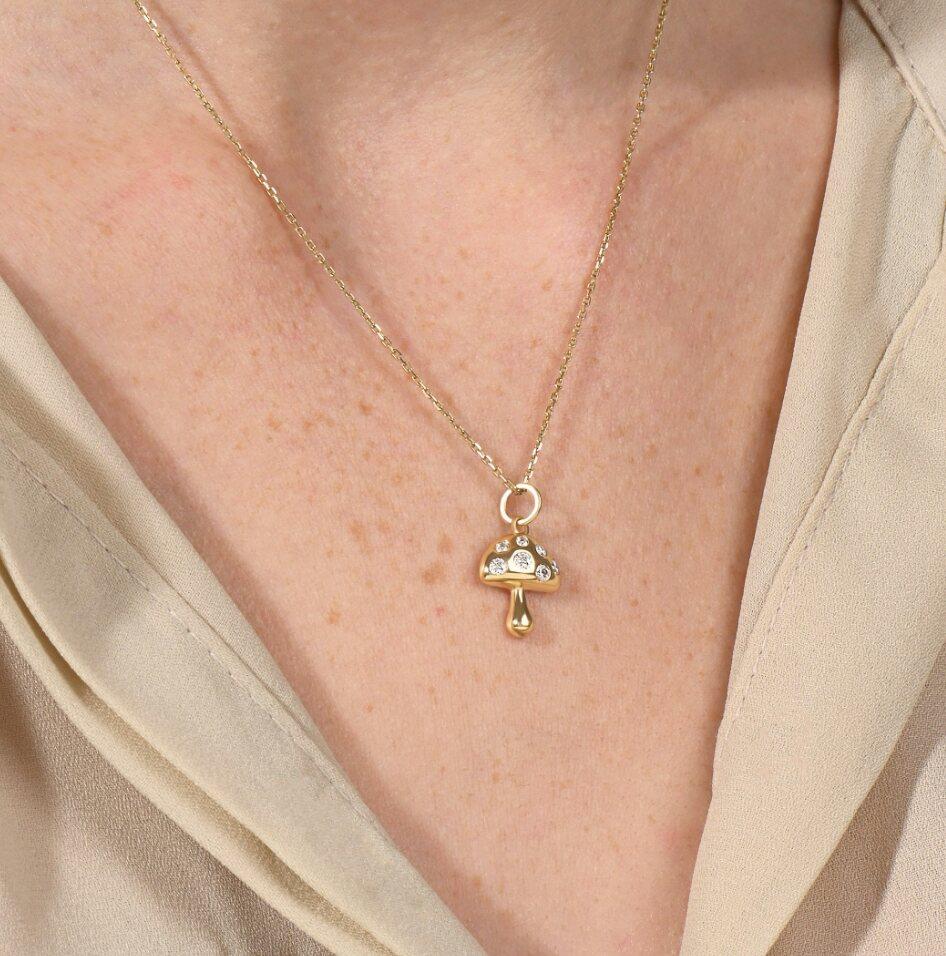 14K Solid Gold Mushroom Pendant Tiny Mushroom Charm Necklace Diamond Necklaces.

Necklace Length : 18th Inch.
Diamond Clarity Grade: Very Slightly Included (VS2)
Main Stone: Diamond
Size: 14.8x11 mm Approx
Thickness: 3.20 mm Approx....
