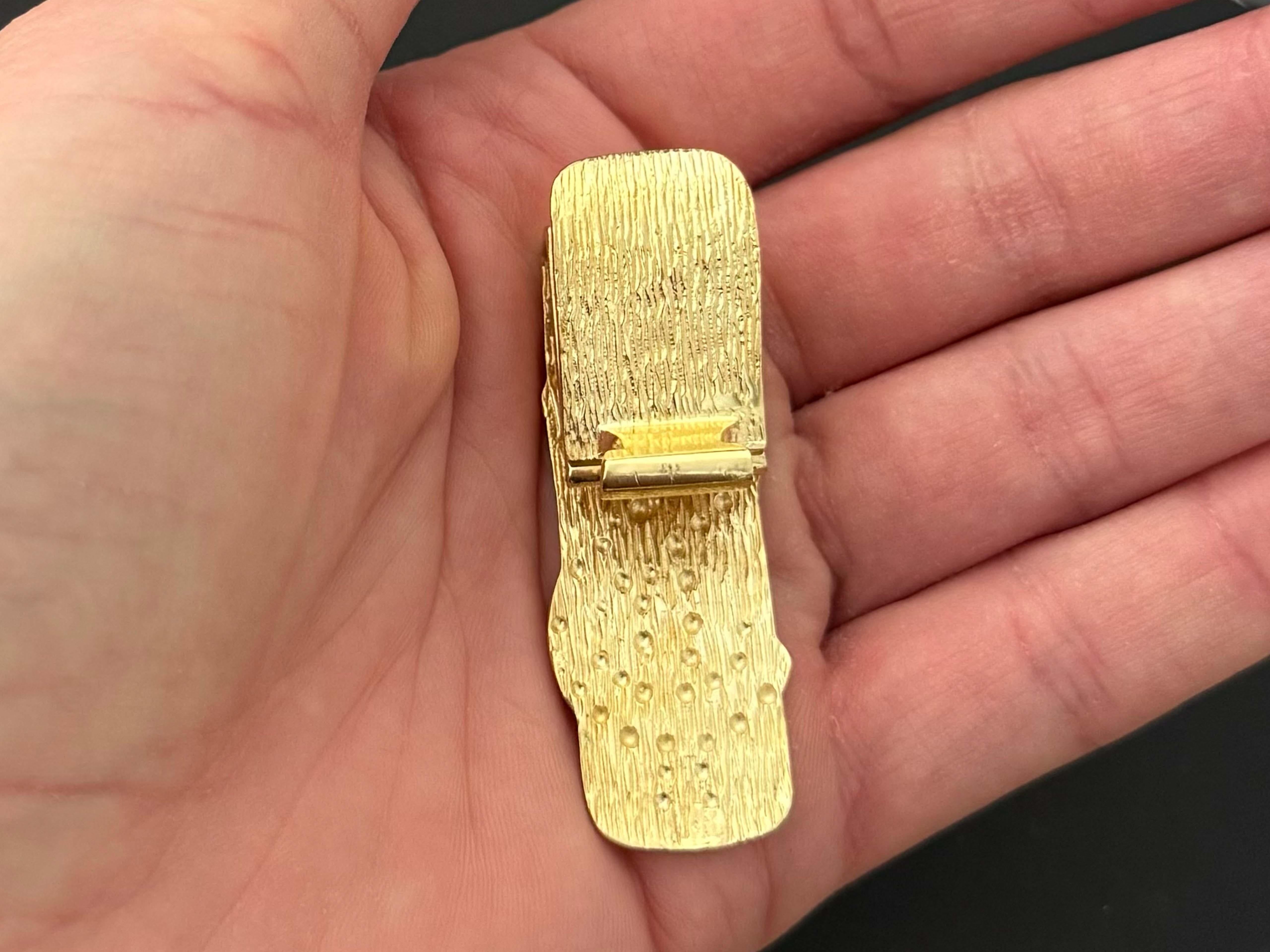 Item Specifications:

Style: Money Clip

Metal: 14k yellow gold

Measurements: 1.85