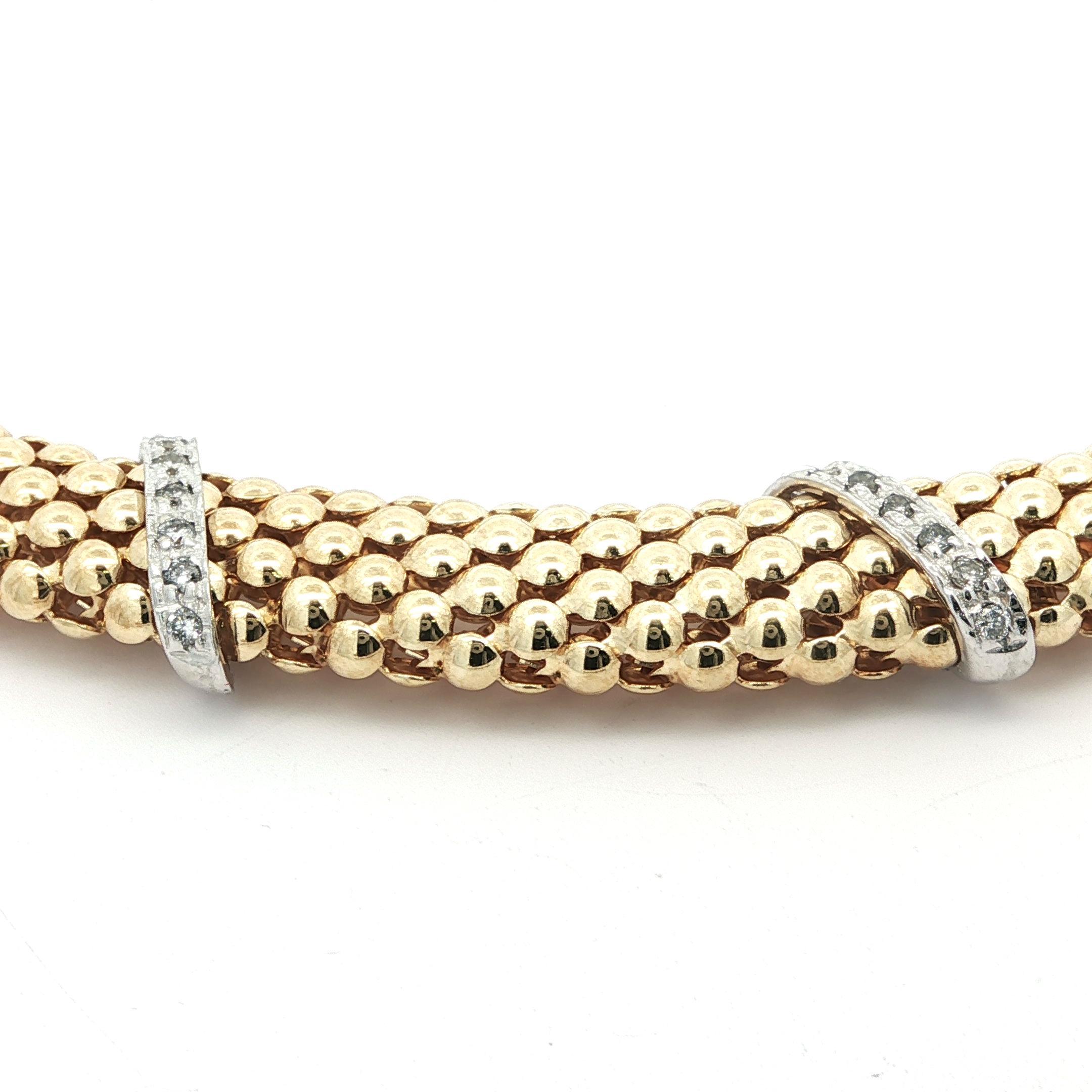 --Stein(e)--
(35) Echte natürliche Diamanten - runder Brillantschliff - Pave Set - schöne weiße Brillanten - 0,20ctw (ca.)

MATERIAL: Massiv 14k Gelbgold & Weißgold
Gewicht: 34,44 Gramm
Kettentyp: Breite Popcorn-Glieder mit Diamant-Stationen
Kette