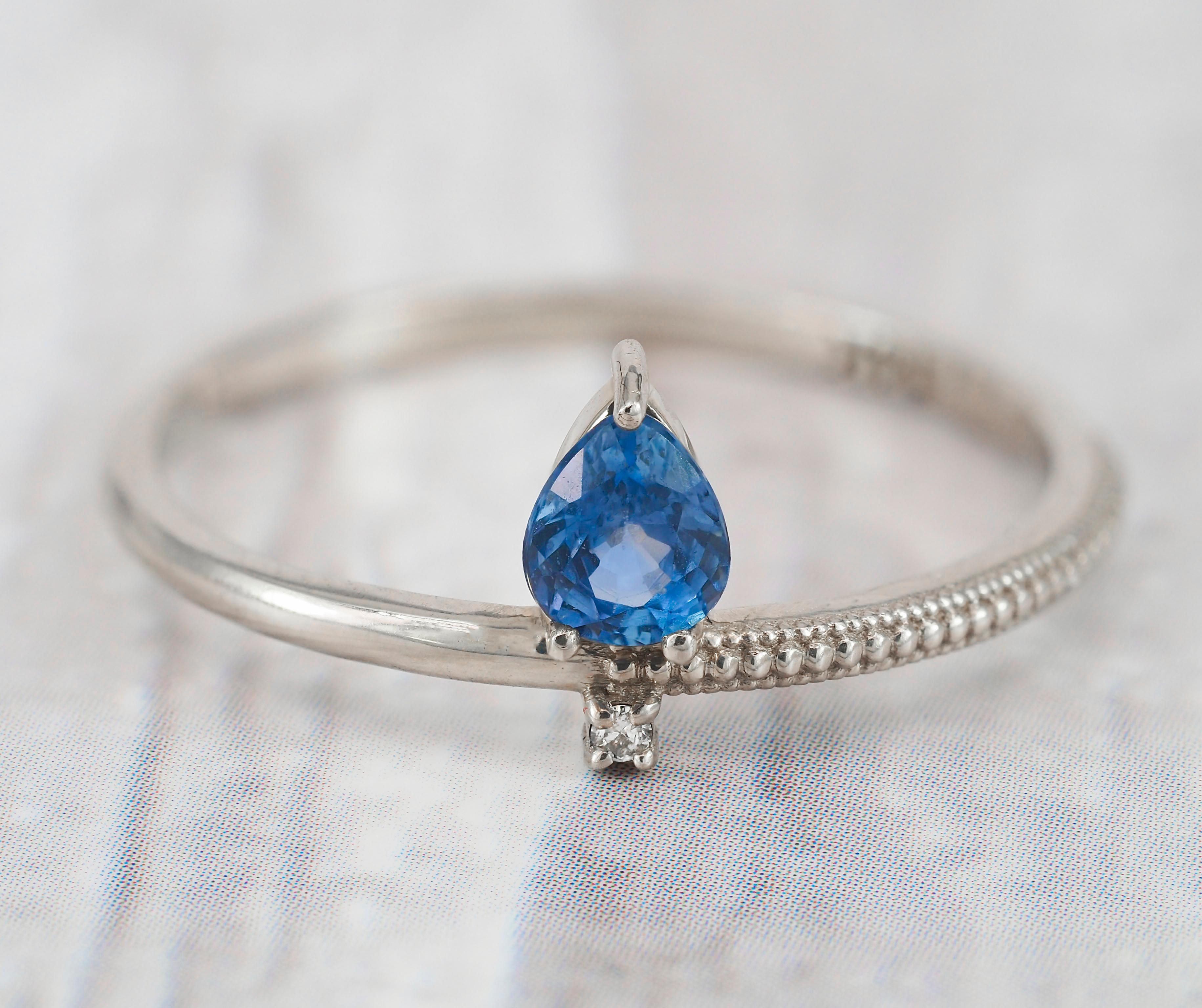 14k solid gold ring with pear 0.5 ct sapphire. 
Blue gemstone ring. September birthstone ring. Genuine sapphire ring. Vintage engagement ring.

Metal: 14k gold
Weight: 1.5 g. depends from size.

Set with sapphire, color -  blue
Pear cut, 0.50 ct. in