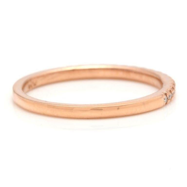 14K Solid Rose Gold Diamond Wedding Band Ring

Natural Round Diamonds Weight: Approx. 0.20 Carats (color G-H / Clarity SI1-SI2)

Ring total weight: Approx. 1.6 gram

Ring size: 6.5 (we offer free re-sizing upon request)

Disclaimer: all weights,