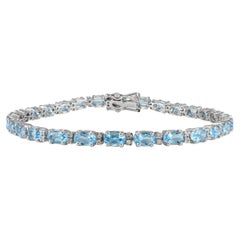 Bracelet tennis moderne en or blanc massif 14 carats avec topaze bleue ovale et diamants 8,04 carats