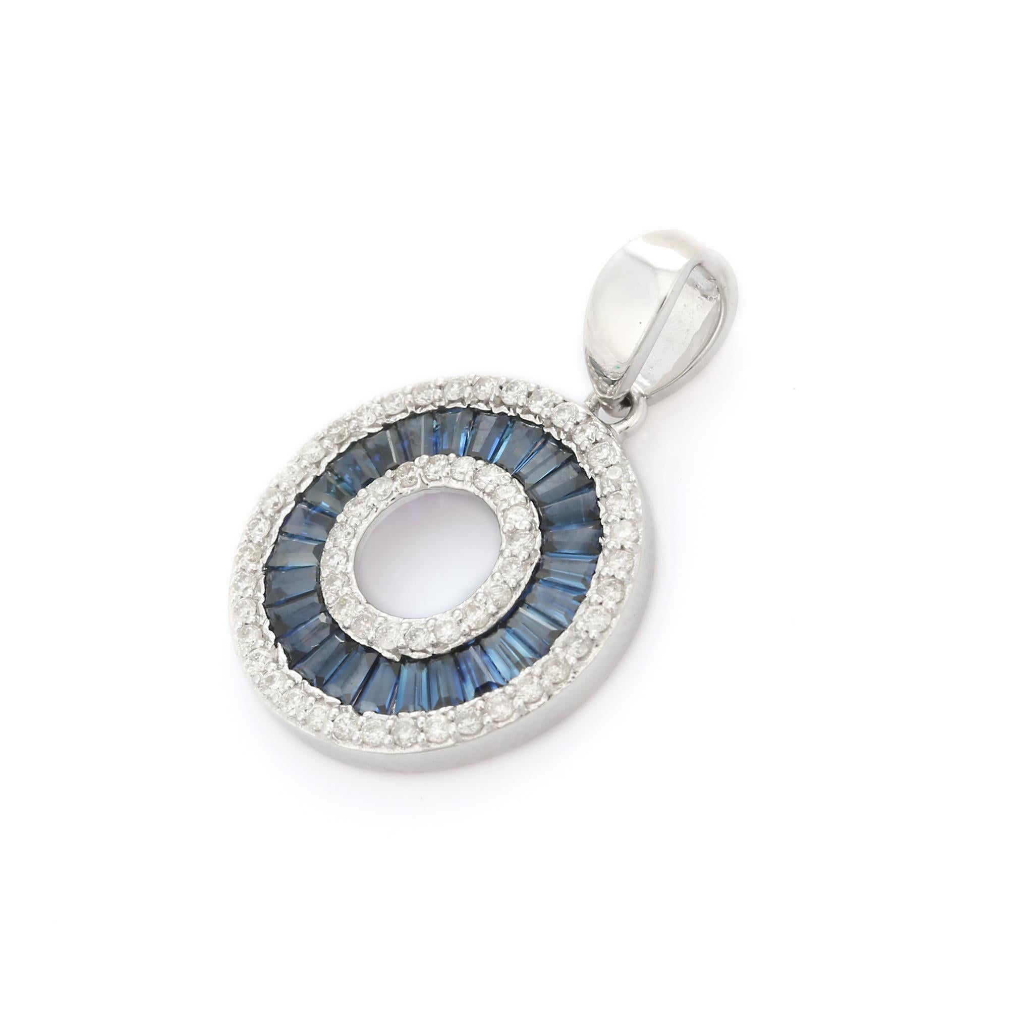 Blue Sapphire pendant in 14K Gold. It has a baguette cut Blue sapphires studded with diamonds that completes your look with a decent touch. Pendants are used to wear or gifted to represent love and promises. It's an attractive jewelry piece that