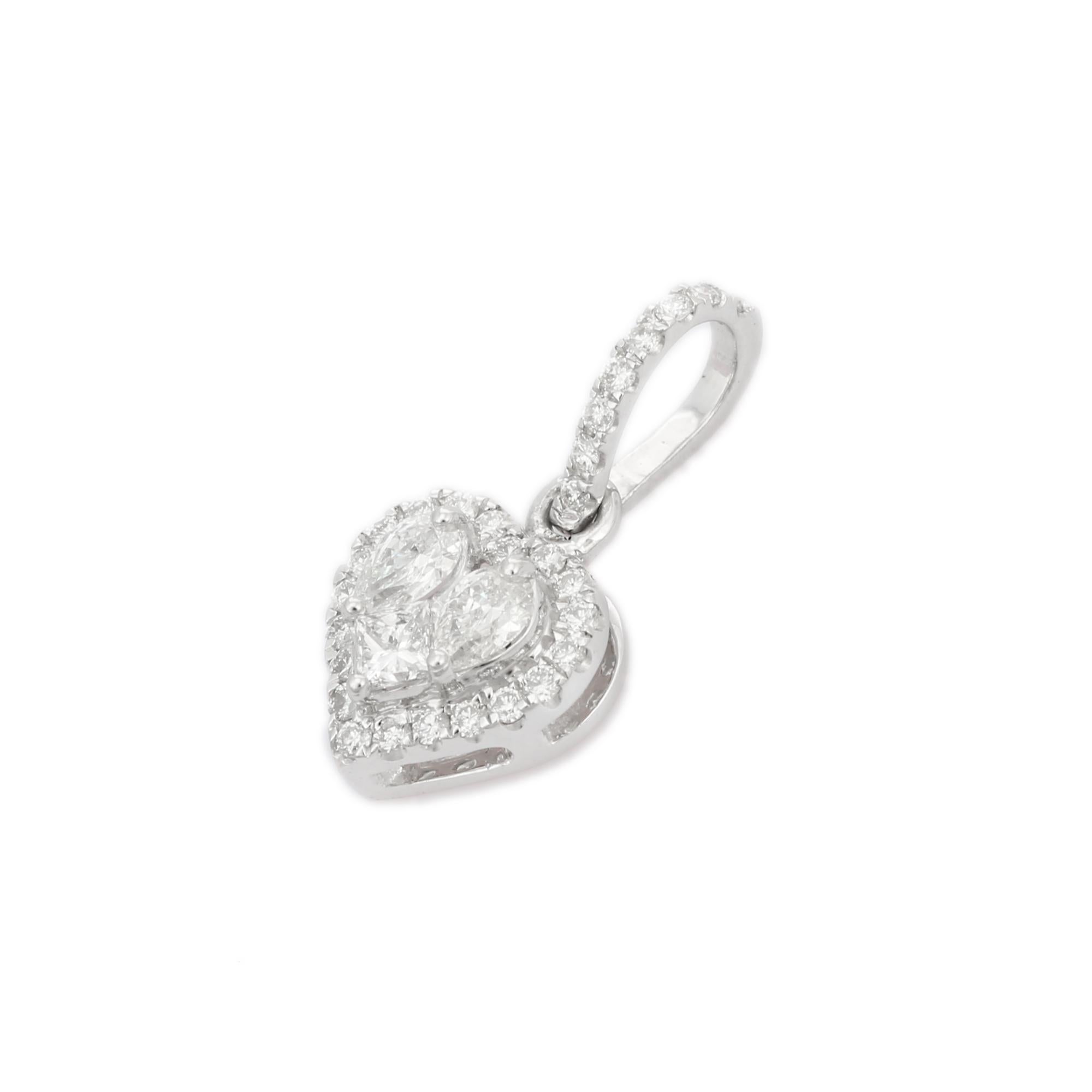 Dainty Diamond Heart Pendant in 14K Gold with diamond studded in gold. This stunning piece of jewelry instantly elevates a casual look or dressy outfit. 
April birthstone diamond brings love, fame, success and prosperity.
Designed with mixed cut