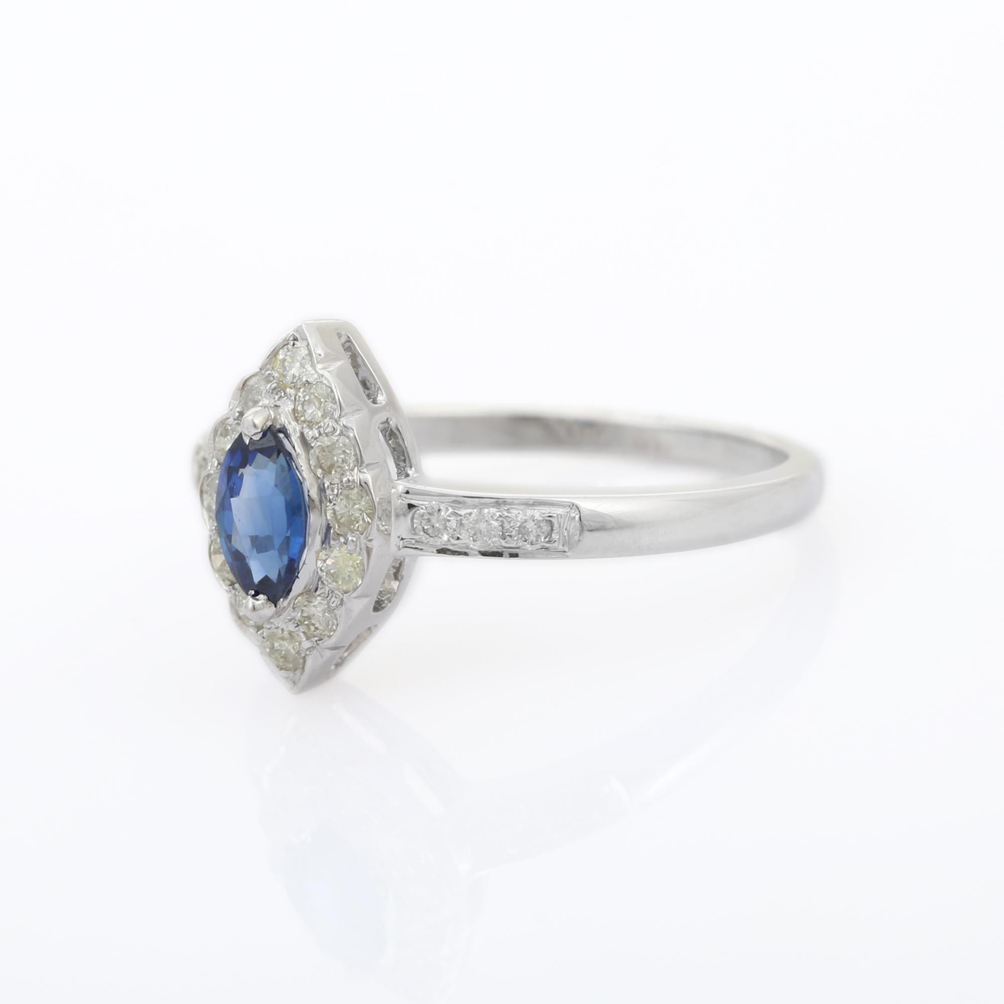 En vente :  Bague de fiançailles en or blanc massif 14 carats avec saphir bleu marquise et halo de diamants 3