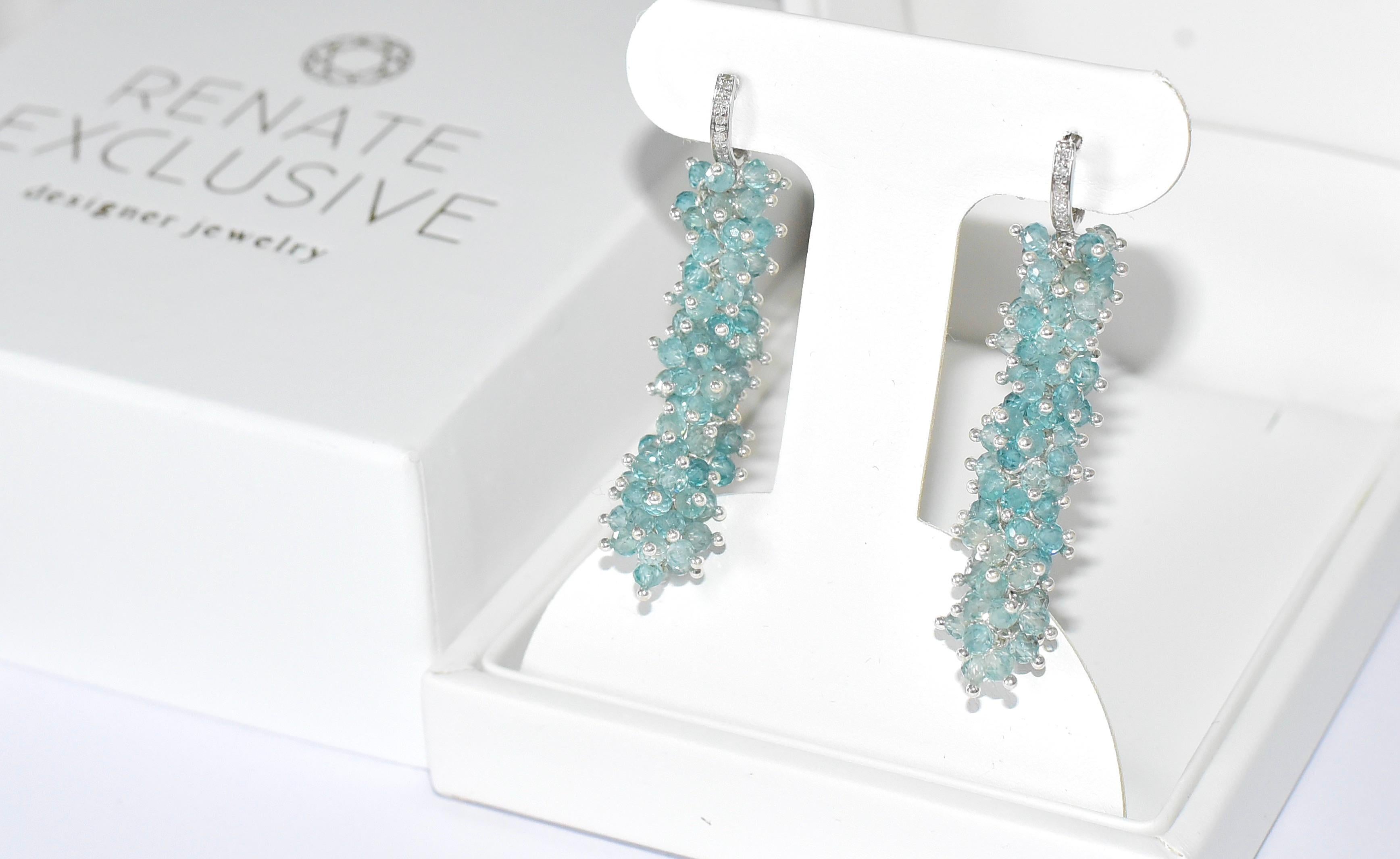 Shiny Blue Zircon beads with extraordinary 14K Solid White Gold ear wires with sparkly diamond are the beginning of the festive season! Are you ready for the red carpet evening? 
Certainly, the picture does not give the beauty of these earrings. But