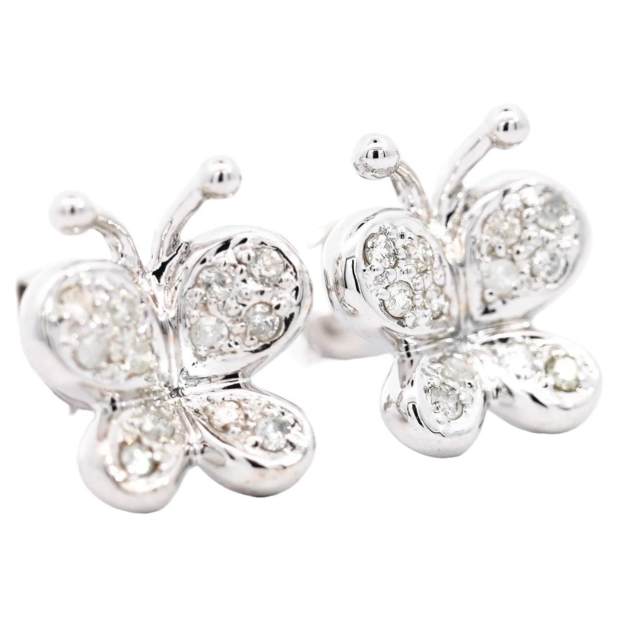 14K Solid White Gold Mounts Natural Diamond Butterfly Stud Earrings.

Fixed with push-back closure and a smooth polished finish. Cute, dainty, and full of class. These stud earrings are the ideal gift for animal lovers in search of something that's