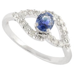 Alluring Blue Sapphire Ring with Diamonds Set in 14K Solid White Gold