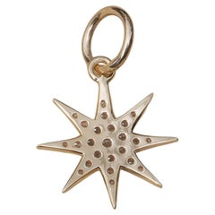 Ciondolo a stella a otto punte con pavé di diamanti in oro giallo massiccio 14K da 0,18 carati