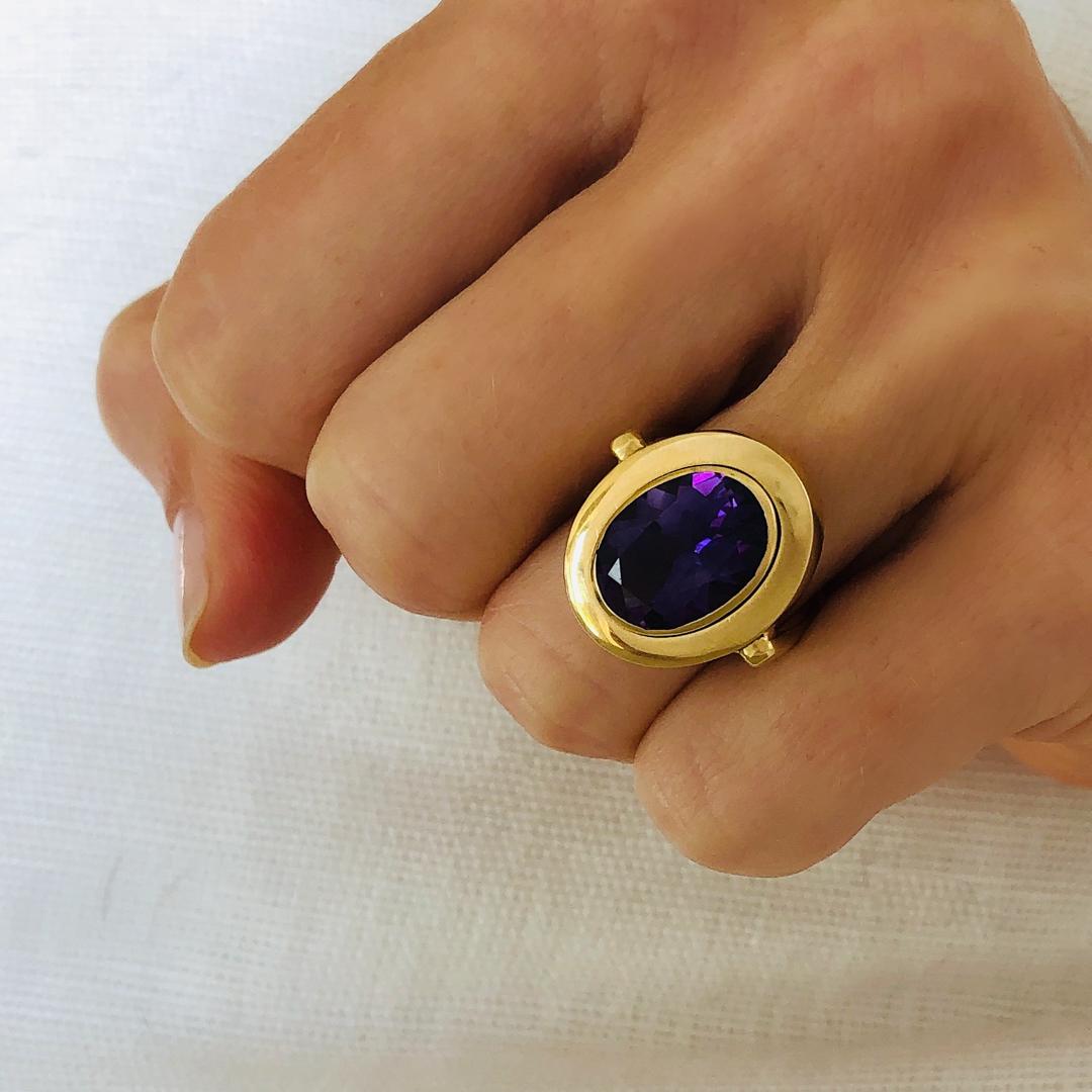 Royal purple, this intense Amethyst Ring is made for a February baby who likes to express herself. Set in 14k Solid Yellow Gold, this classic design and bold color make a statement with a fresh pop of color.

14k Solid Yellow Gold
Amethyst 3.10