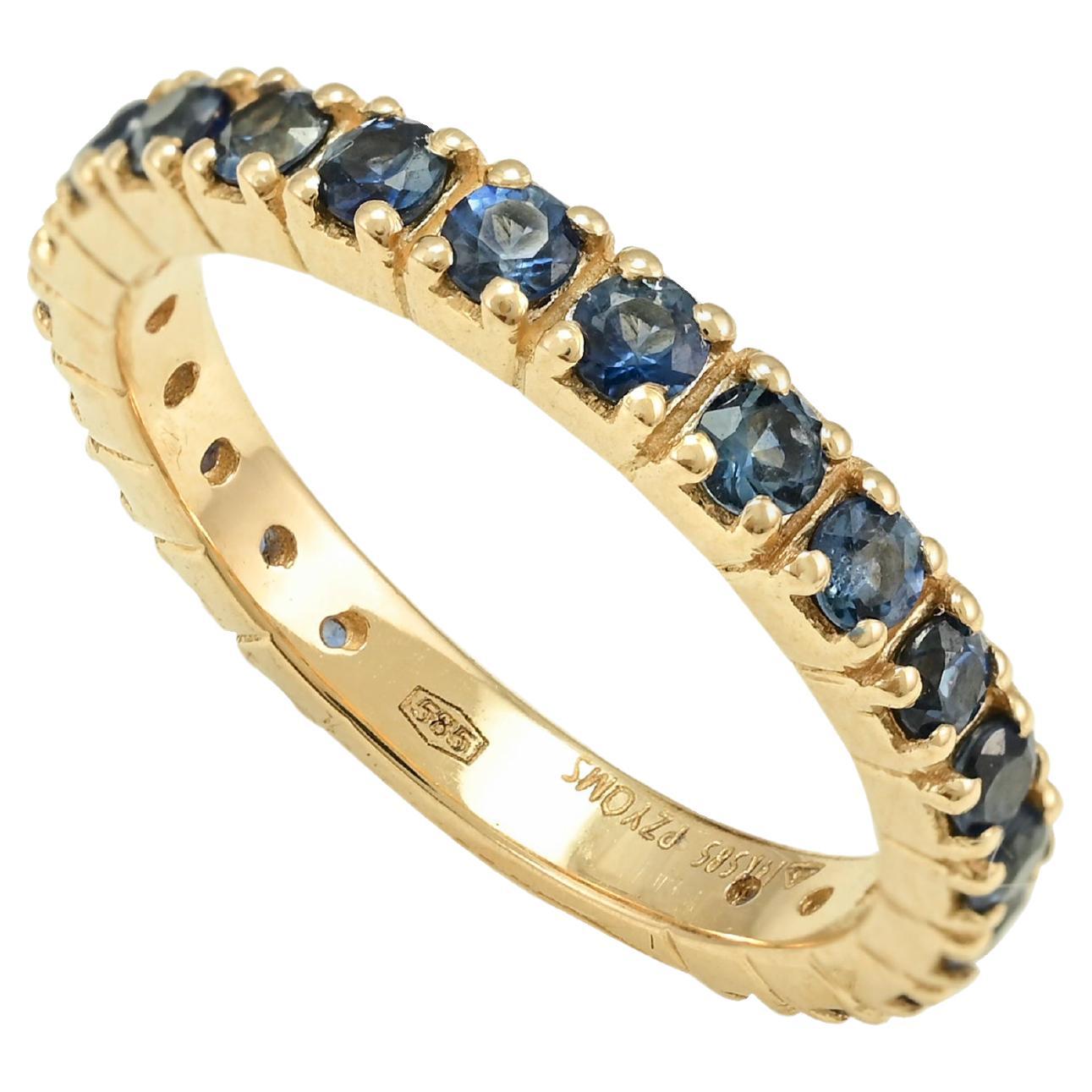 Im Angebot: 14k massives Gelbgold Rundschliff Blauer Saphir Geburtsstein Eternity-Ring ()