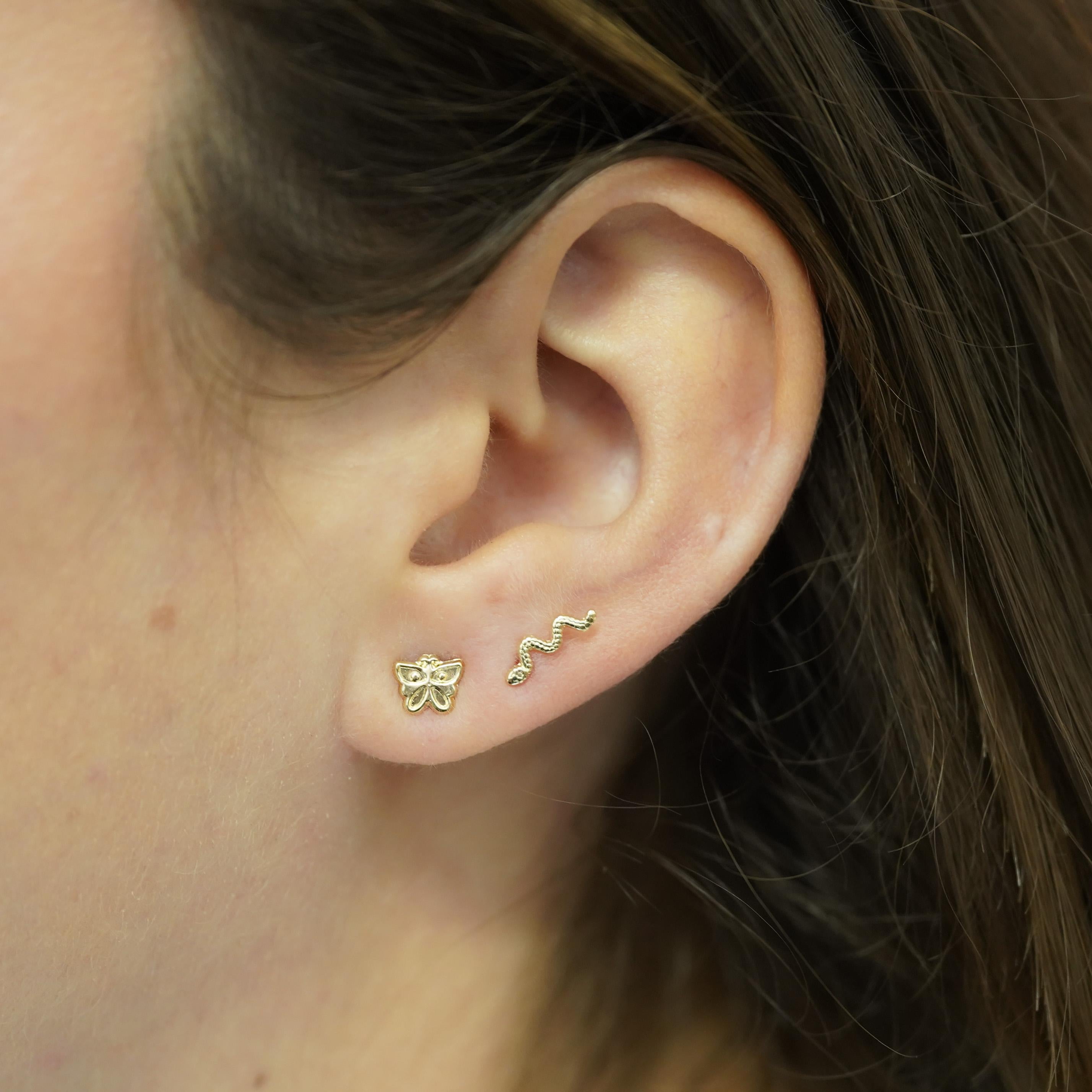14K Yellow Gold Dainty Butterfly Stud Earrings Screw Back Closure.

Made with 14 karat solid yellow gold. Not plated, vermeil, or gold plated. Sold as a pair.

Details:
Item Type: Stud Earrings
Metal: 14K Yellow Gold
Size: 6.5mm x 5.5mm
Closure: