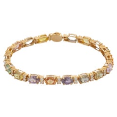 Pulsera de tenis de oro amarillo macizo de 14 quilates con múltiples zafiros y diamantes