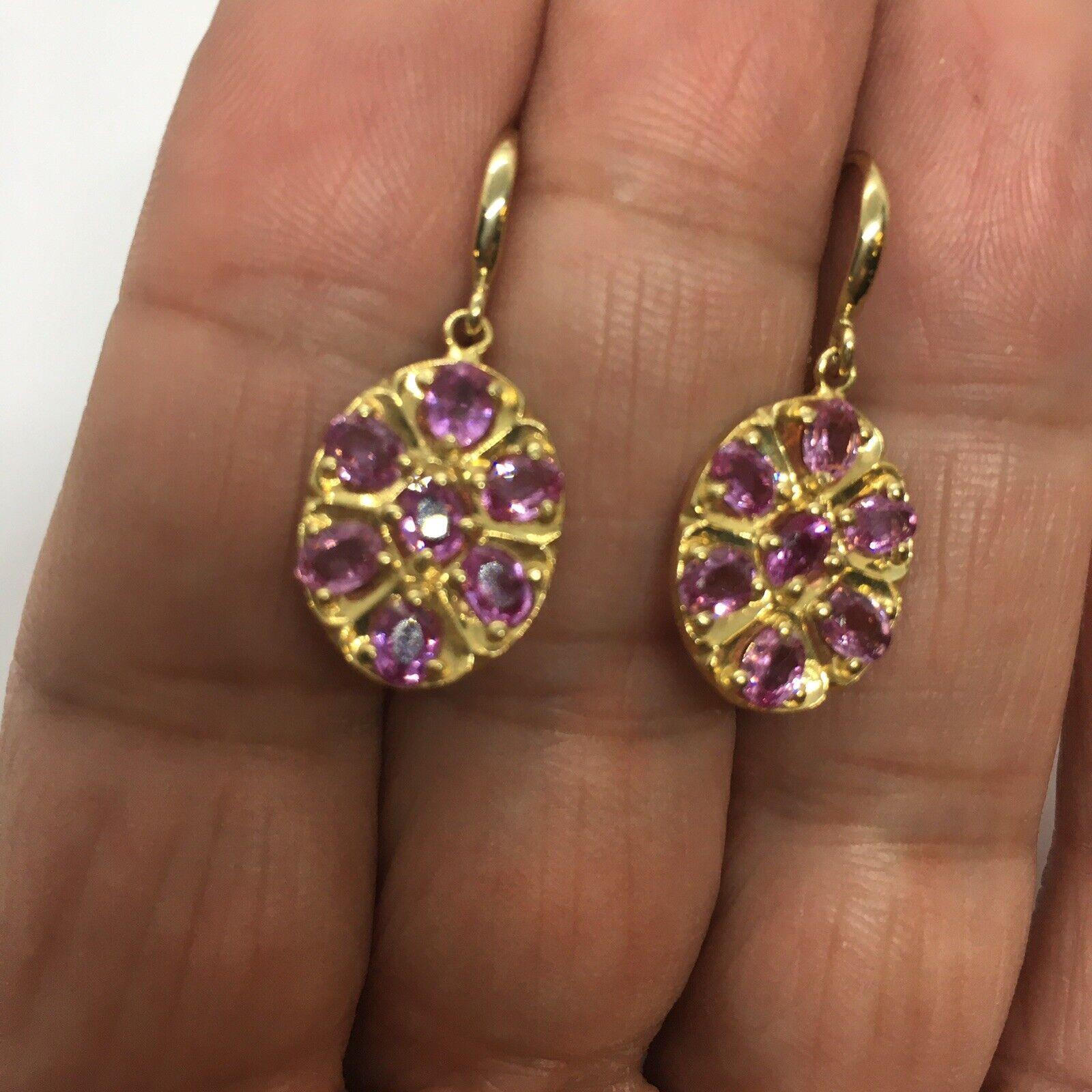 14K Solid Yellow Gold  Oval Pink Sapphire Dangling Wire Earrings Hanging 1.25 In


4.7 gram weight
14 Pieces of Oval Cut natural Pink Sapphire 
hanging 1.25 inch 