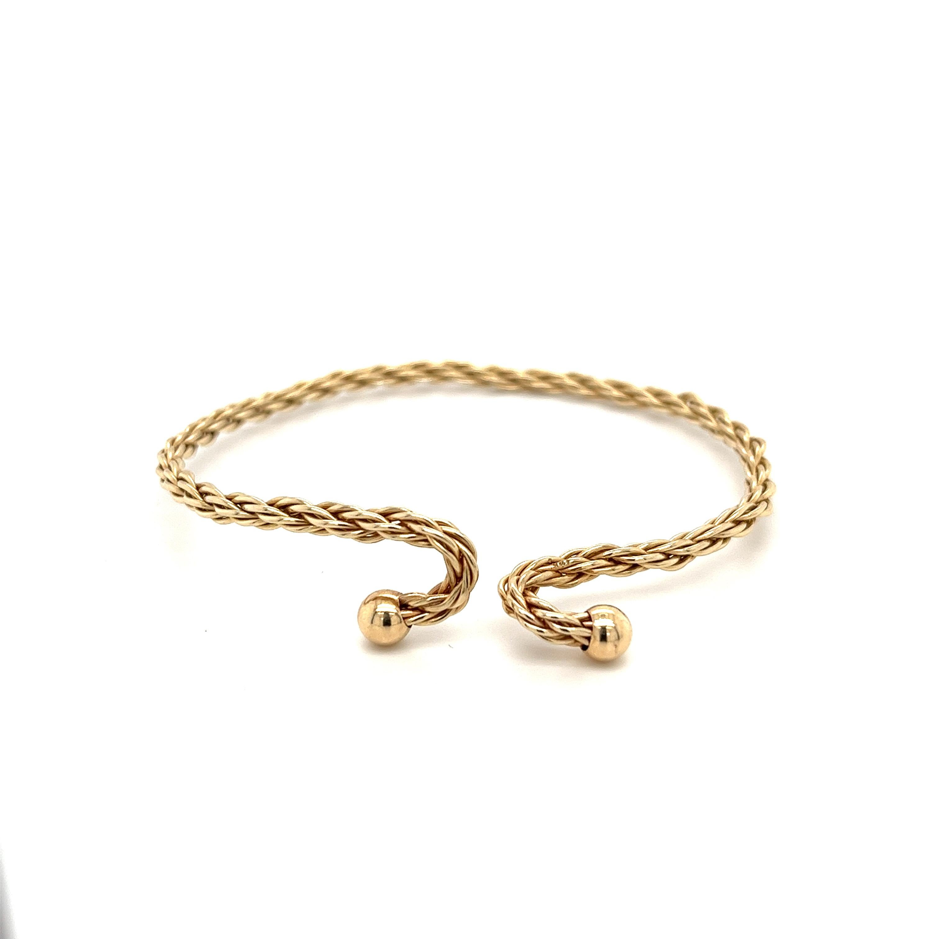 SKU: POTC1449B 

Interlocking 14k solid yellow gold rope chain bangle bracelet. Hypoallergenic and waterproof. The perfect fine jewelry gift for that special someone.

Details:
✔ Metal: 14k (solid)
✔ 5-inch Diameter
✔ 3mm Width
✔ Rope Chain