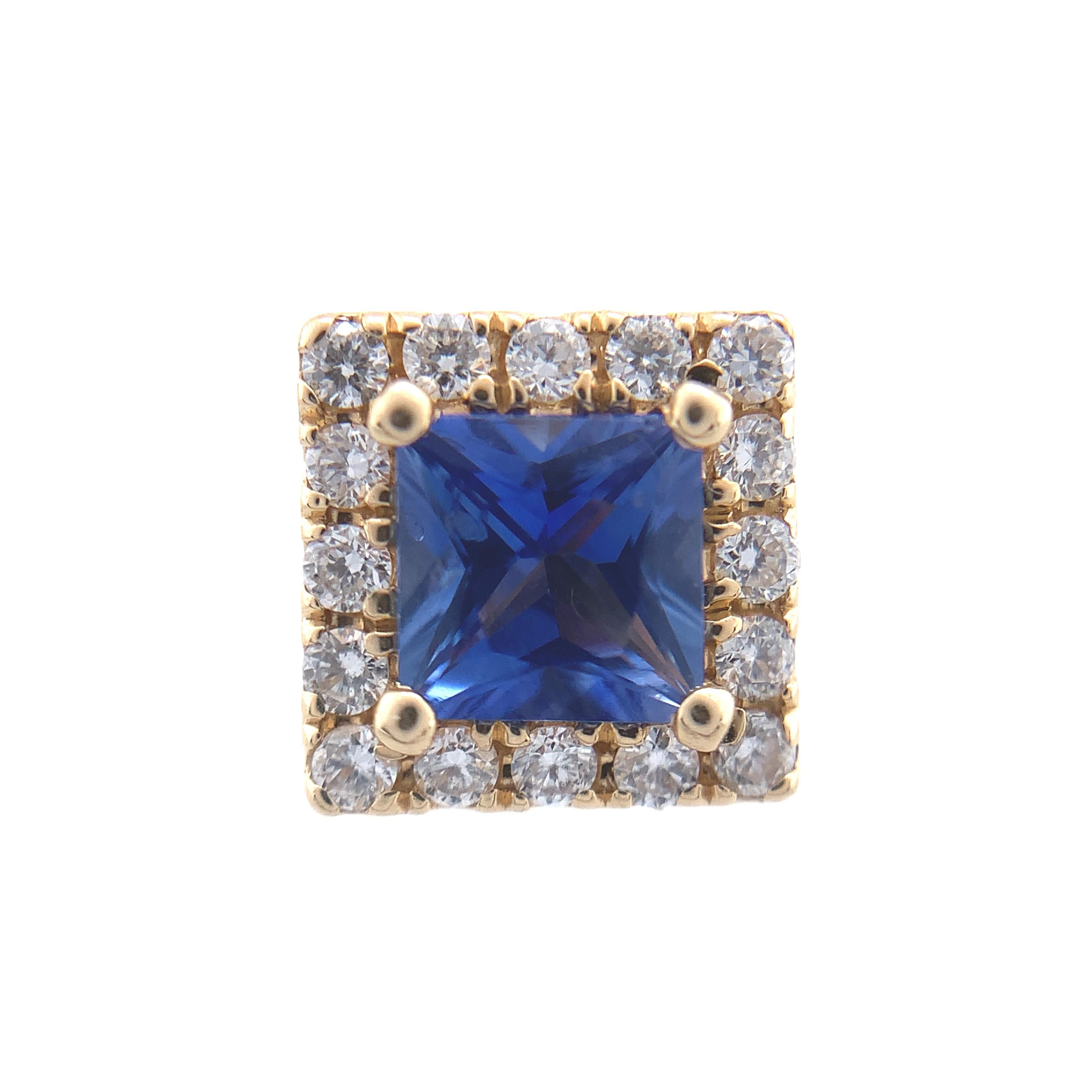A pair of 14K Yellow gold square stud earrings featuring princess cut blue sapphires. The sapphires are a beautiful medium blue color. The pair weighs .81cts total and measure about 4mm. There are 32 tiny round brilliant cut diamonds weighing .22cts