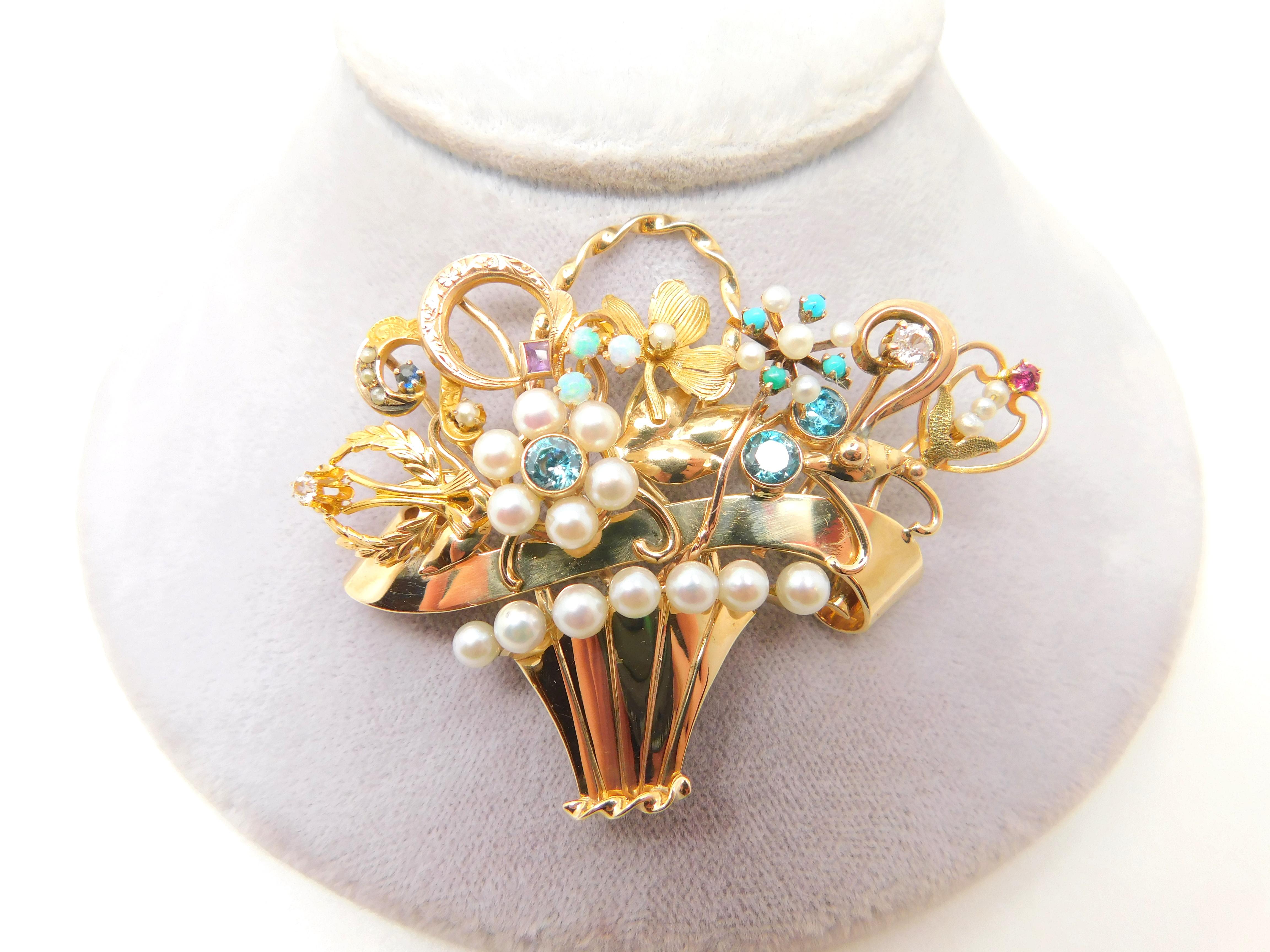 Beautiful 14K yellow gold stick pin collection flower basket brooch.  The pin has 8 stick pins including: blue zircon, cultured pearls, opals, turquoise, diamond, amethyst, sapphire, bird with ruby, and more.  The pearls range from seed pearls