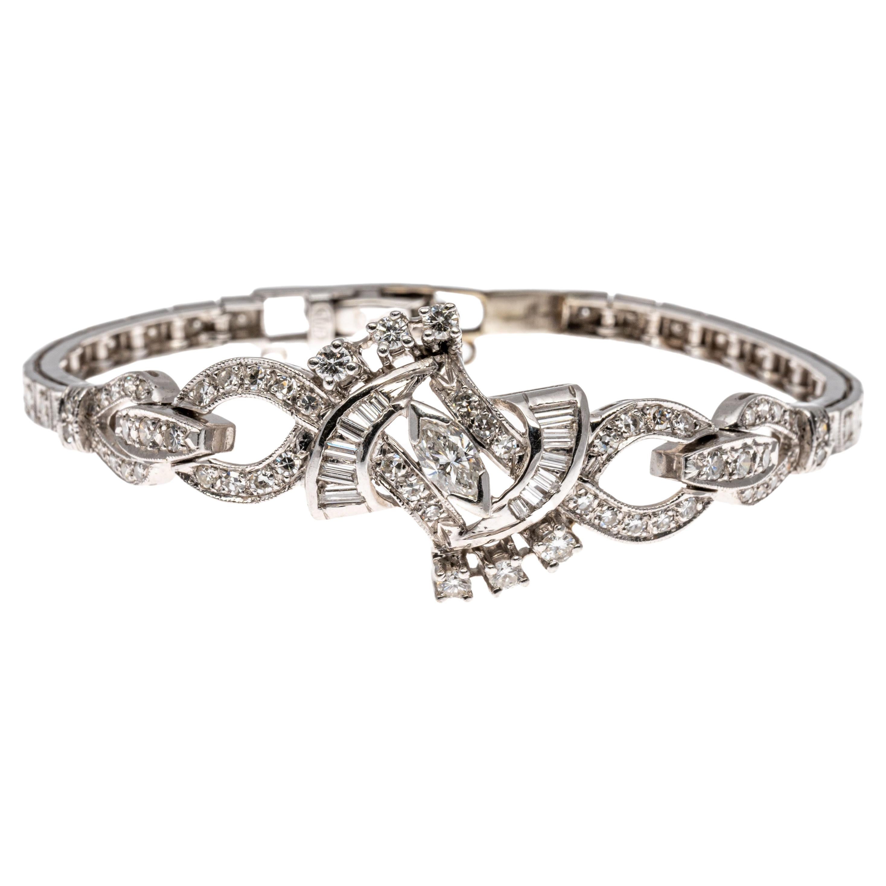 Bracelet rétro en or 14 carats avec diamants baguettes, marquises et ronds, environ 1,15 carat poids total en vente