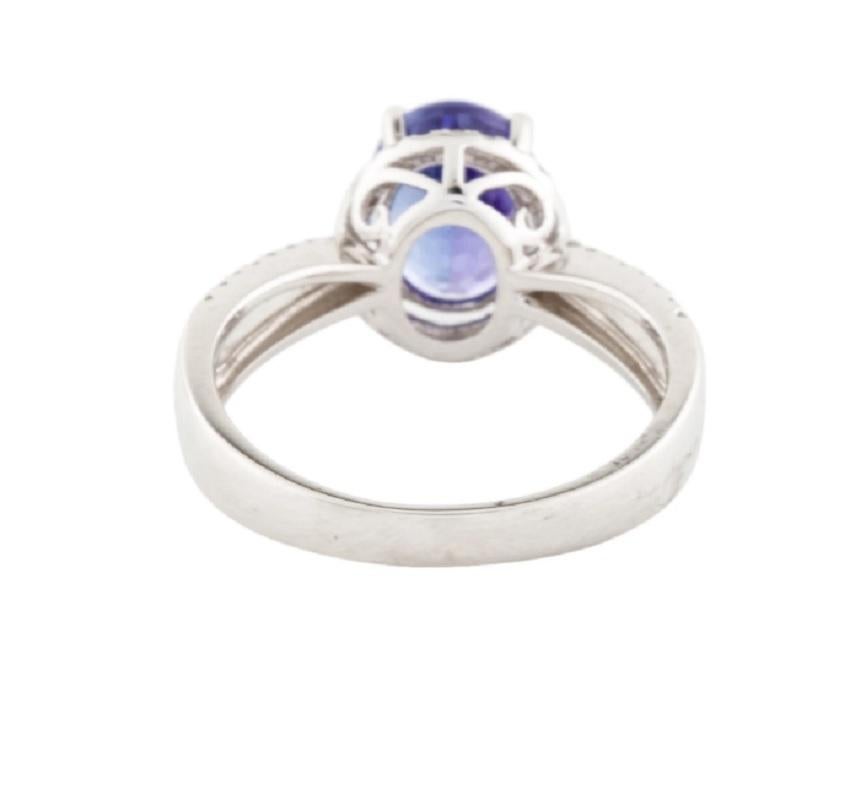 Round Cut 14k Tanzanite and Diamond Cocktail Ring For Sale