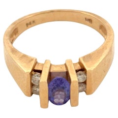 14K Tanzanite Middle Stone and Flanked Diamond Side Ring
