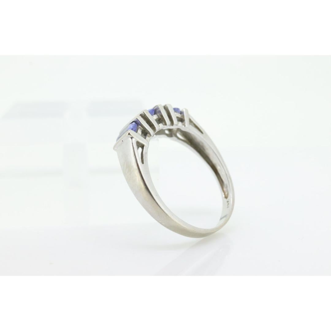 14k Tanzanite Oval and Diamond Channel Anniversary ring. Channel set eternity For Sale 2