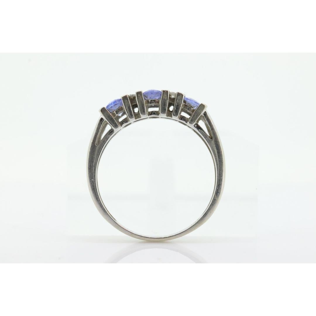 14k Tanzanite Oval and Diamond Channel Anniversary ring. Channel set eternity For Sale 3