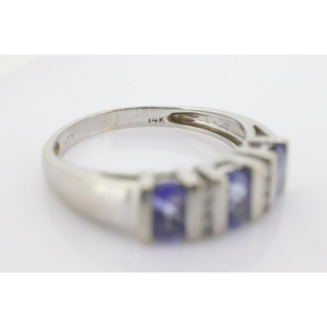 14k Tanzanite Oval and Diamond Channel Anniversary ring. Channel set eternity For Sale 4