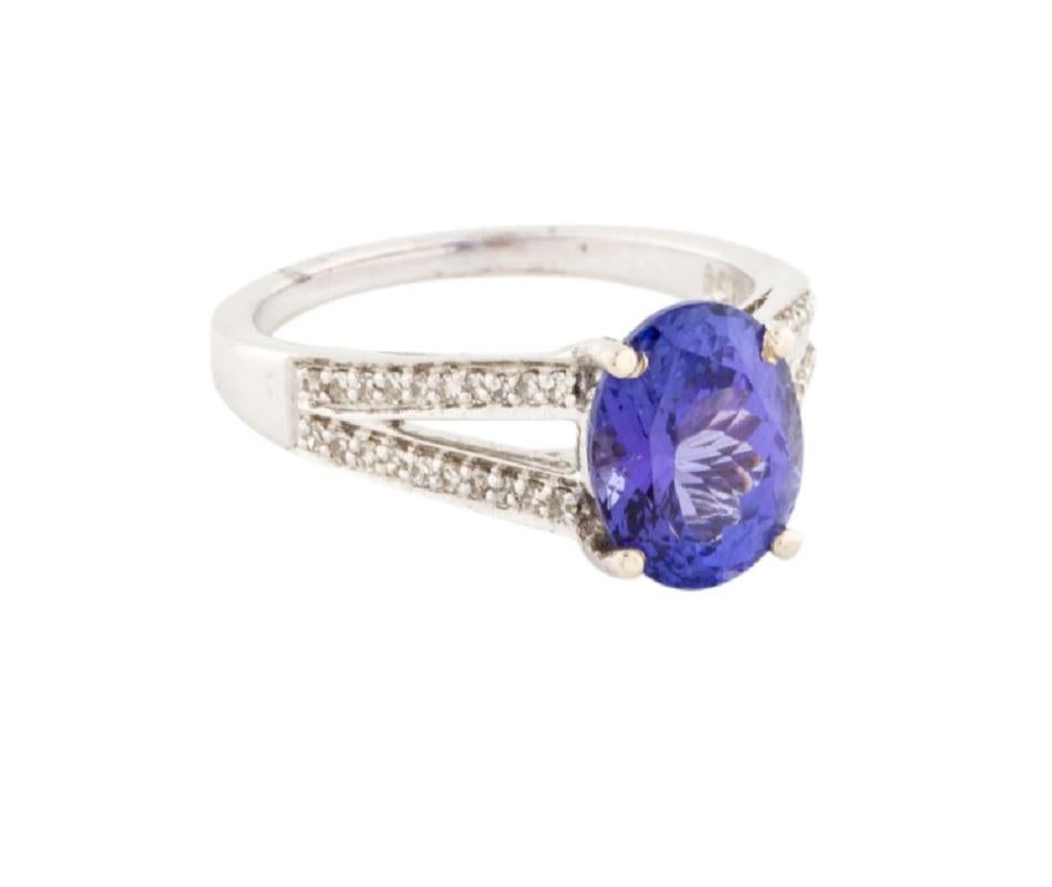 This gorgeous 14K white gold diamond and tanzanite ring is beautiful. the top of the ring is decorated with tanzanite and round brilliant diamonds.
*****
Details:
►Metal: White Gold
►Gold Purity: 14K
►Diamond Shape: Round Brilliant
►Diamond Weight:
