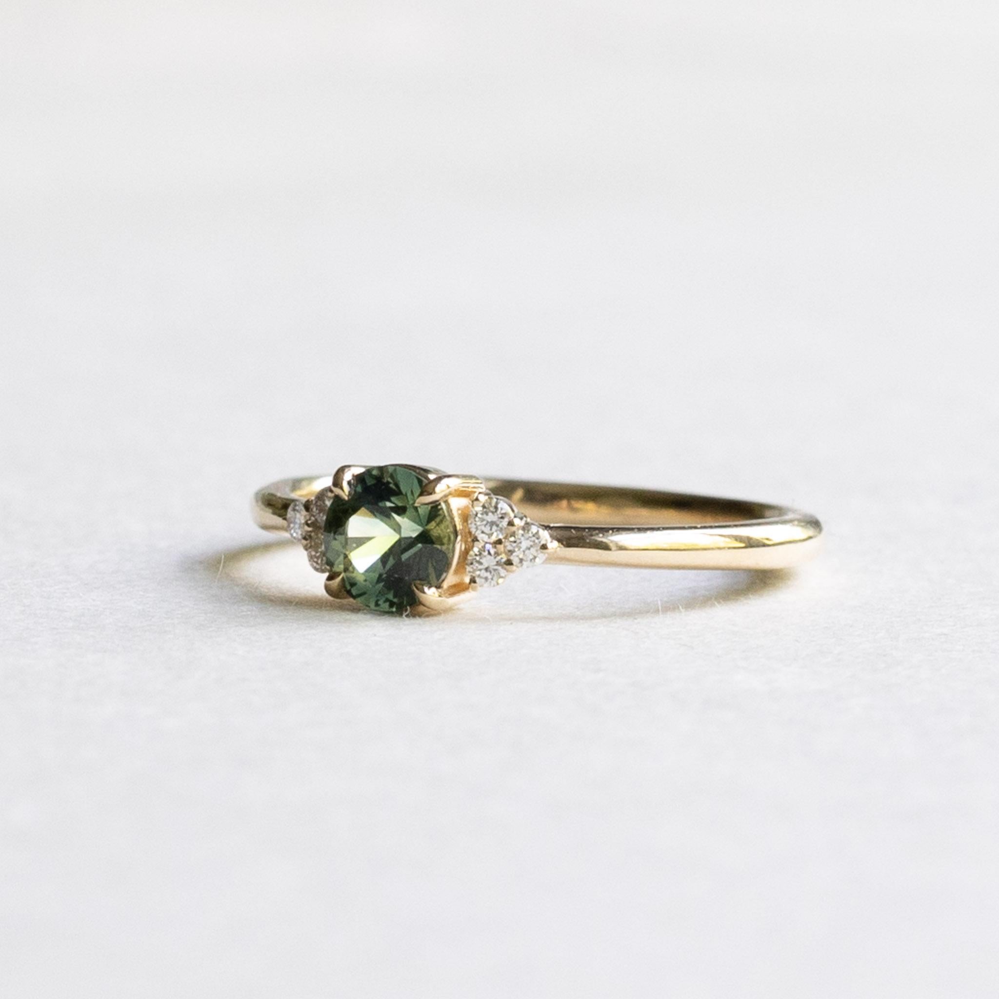 teal green sapphire ring
