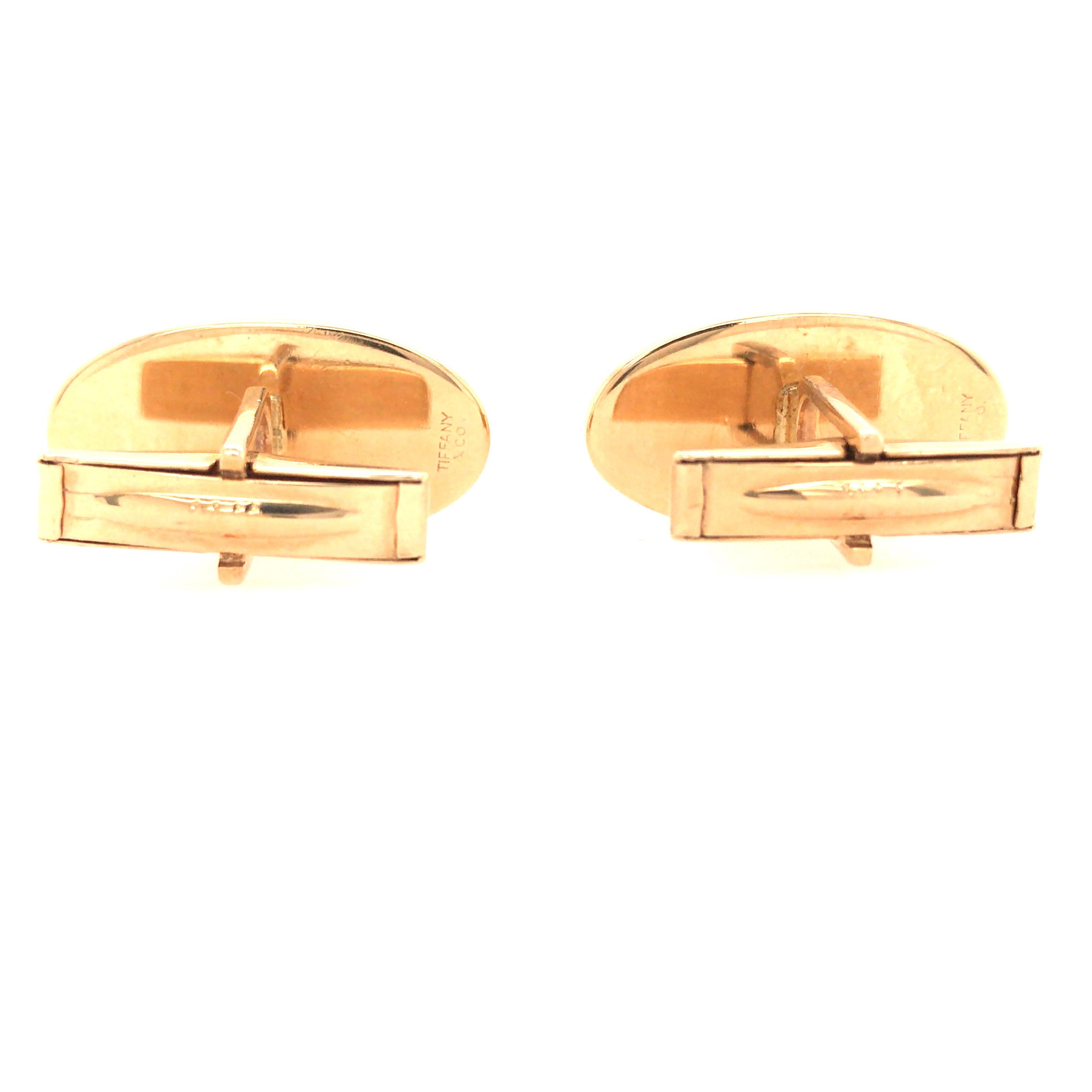 Tiffany & Co classic Oval Cufflinks in 14K Yellow Gold.  1 inch in width.  21.6 grams. Signed.