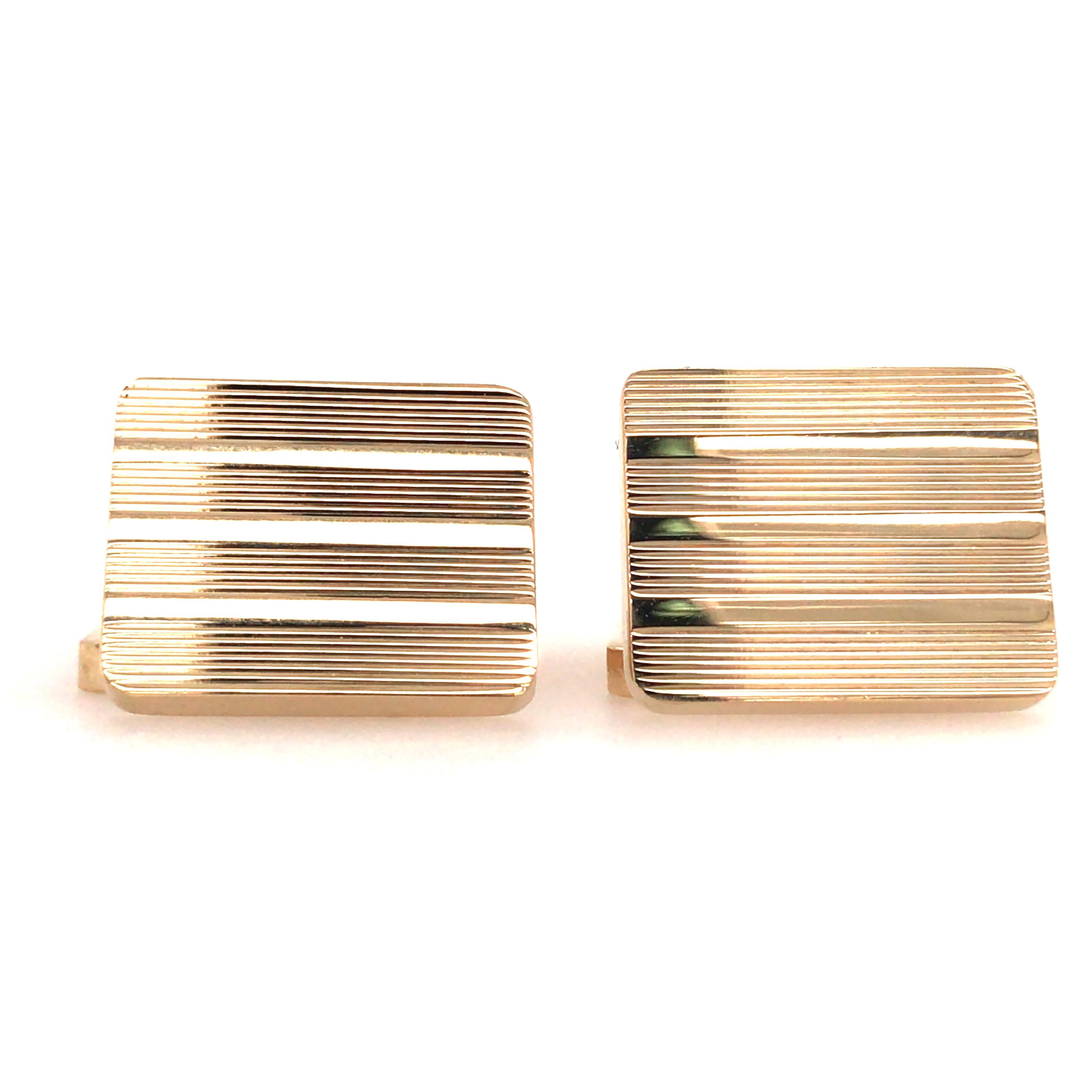 Tiffany & Co. Cufflinks in 14K Yellow Gold.  Each rectangle measures 5/8 inch in length and 1/2 inch in width.  19.12 grams.  Stamped 