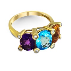 14 Karat Topaz Blue, Topaz Yellow, Amethyst and Diamond Cluster Ring