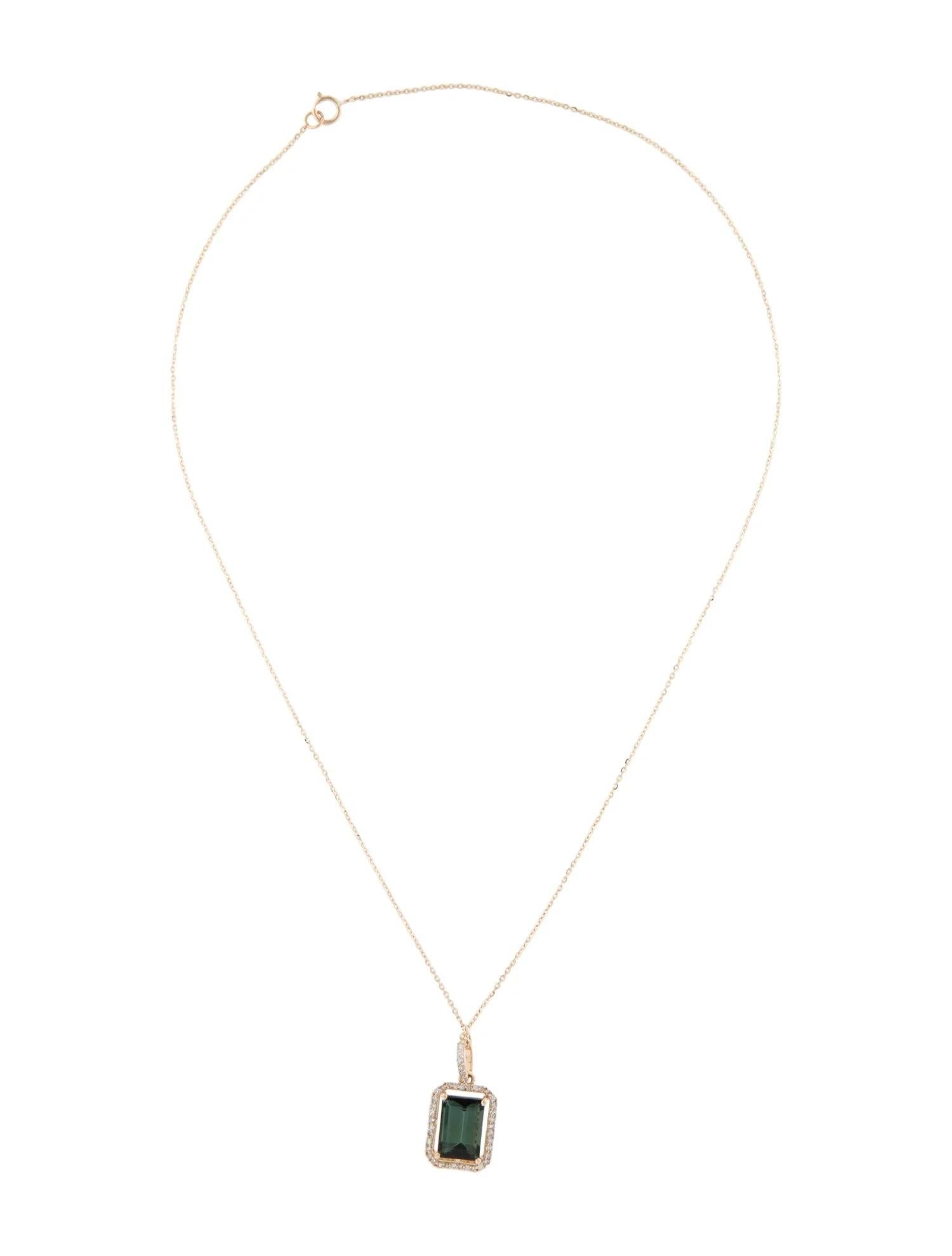 Enhance your jewelry collection with this stunning 14K Yellow Gold Pendant Necklace, featuring a vibrant green tourmaline and sparkling diamonds. This elegant piece is perfect for adding a touch of sophistication and luxury to any
