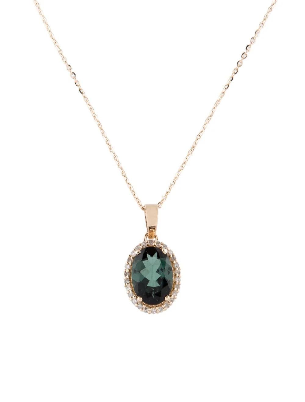 Indulge in the enchanting allure of this exquisite 14K yellow gold pendant necklace, featuring a mesmerizing 1.74 carat oval brilliant tourmaline as its centerpiece. Crafted with meticulous attention to detail, this piece radiates elegance and