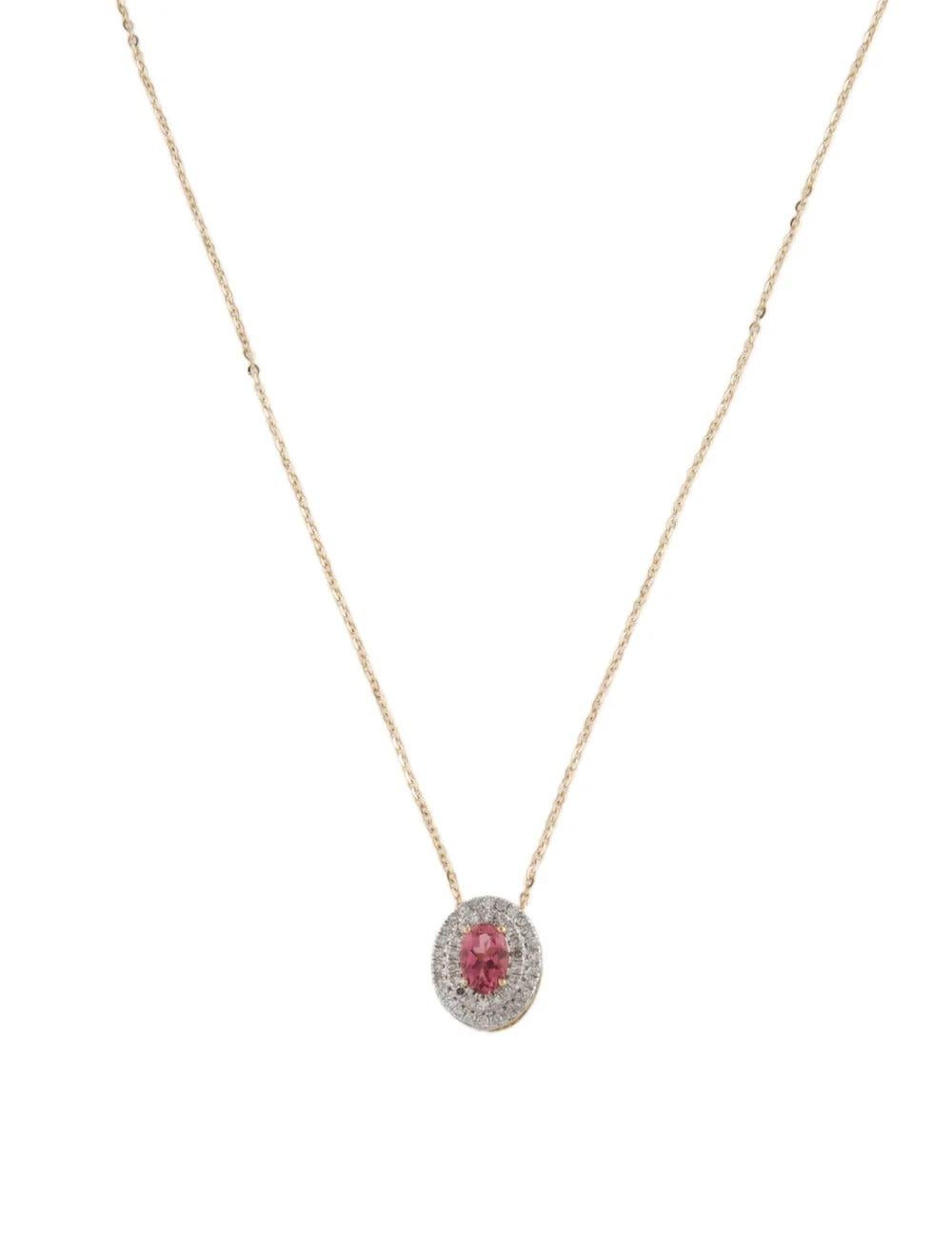 Experience elegance and sophistication with our Rhodium-Plated & 14K Yellow Gold Pendant Necklace, featuring a stunning 0.42 Carat Oval Modified Brilliant Tourmaline. Crafted with meticulous attention to detail, this exquisite piece is sure to