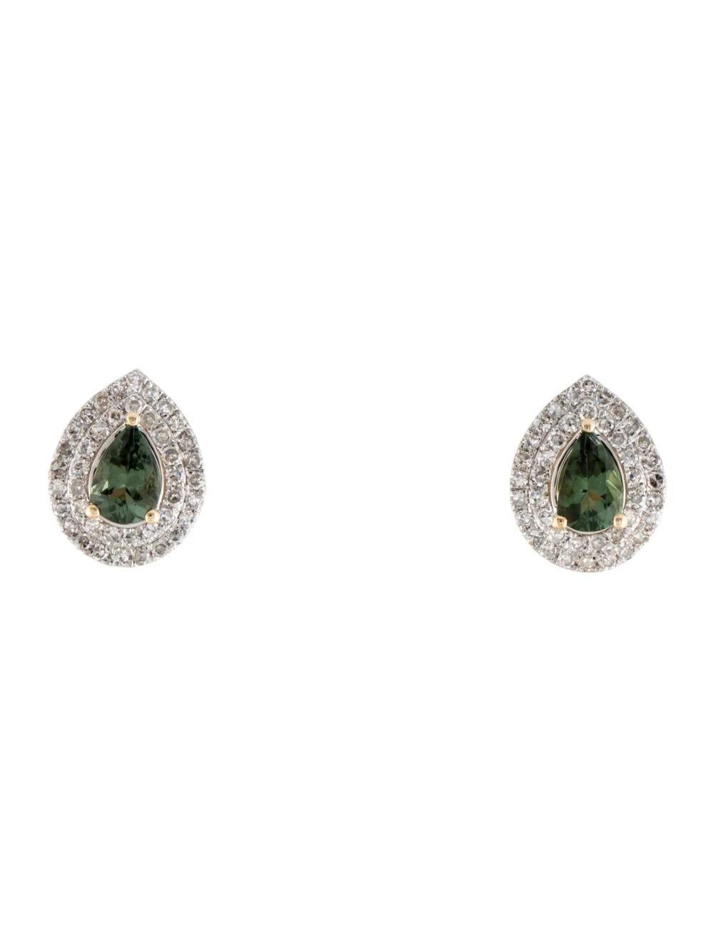 Indulge in the captivating allure of these exquisite stud earrings, meticulously crafted from luxurious rhodium-plated 14K yellow gold. Adorned with stunning gemstones, these earrings exude elegance and sophistication, perfect for any