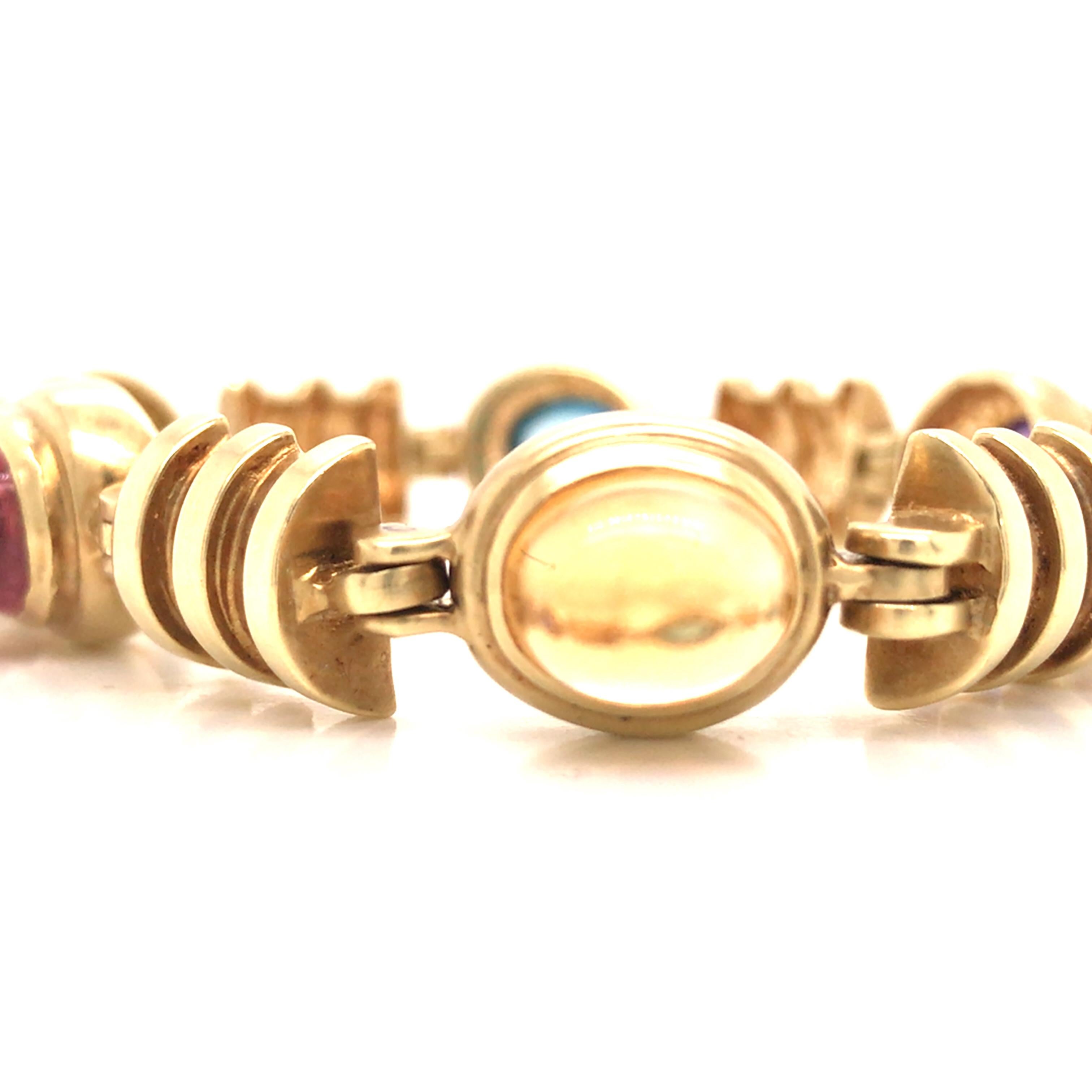 Turmalin-Topas-Citrin-Armband in 14K Gelbgold.  Das Armband misst 7 Zoll in der Länge und 1/2 Zoll in der Breite an der breitesten Stelle. 37.9 Gramm.