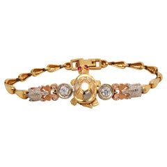 Bracelet tortue en or tricolore 14K avec diamants et rubis