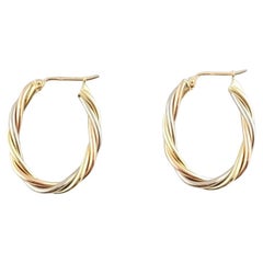14K Tri Color Gold Twist Oval Hoops #16066