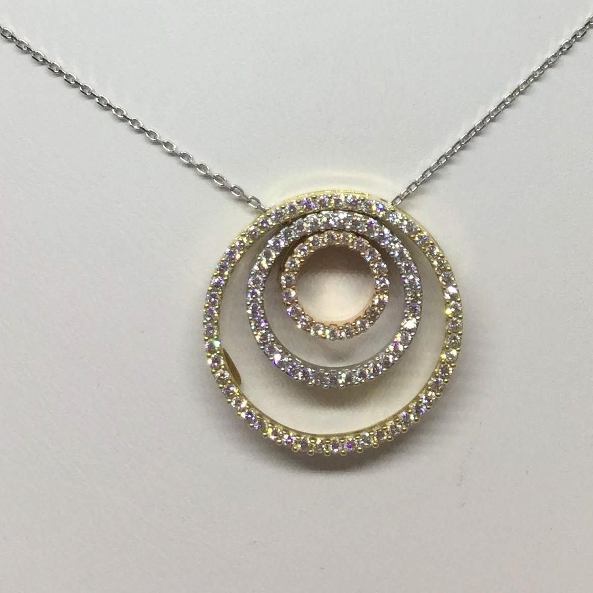 14K Tri-colored gold diamond necklace. The design is made up of 3 free moving rings of diamonds. The diamonds weigh approx 0.75 ctw. The necklace is 16 inches in length.