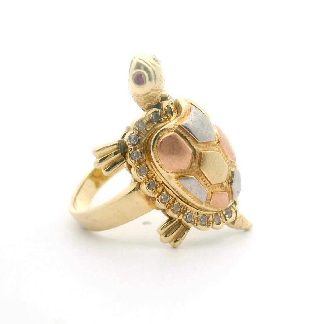 Condition:  Excellent Condition, Professionally Cleaned and Polished
Metal:  14k Gold (Marked, and Professionally Tested)
Weight:  11.6g
Gemstones:  Two Round Pink Sapphires
Gemstones:  Round Cut Cubic Zirconias
Turtle Measurements:  1.3