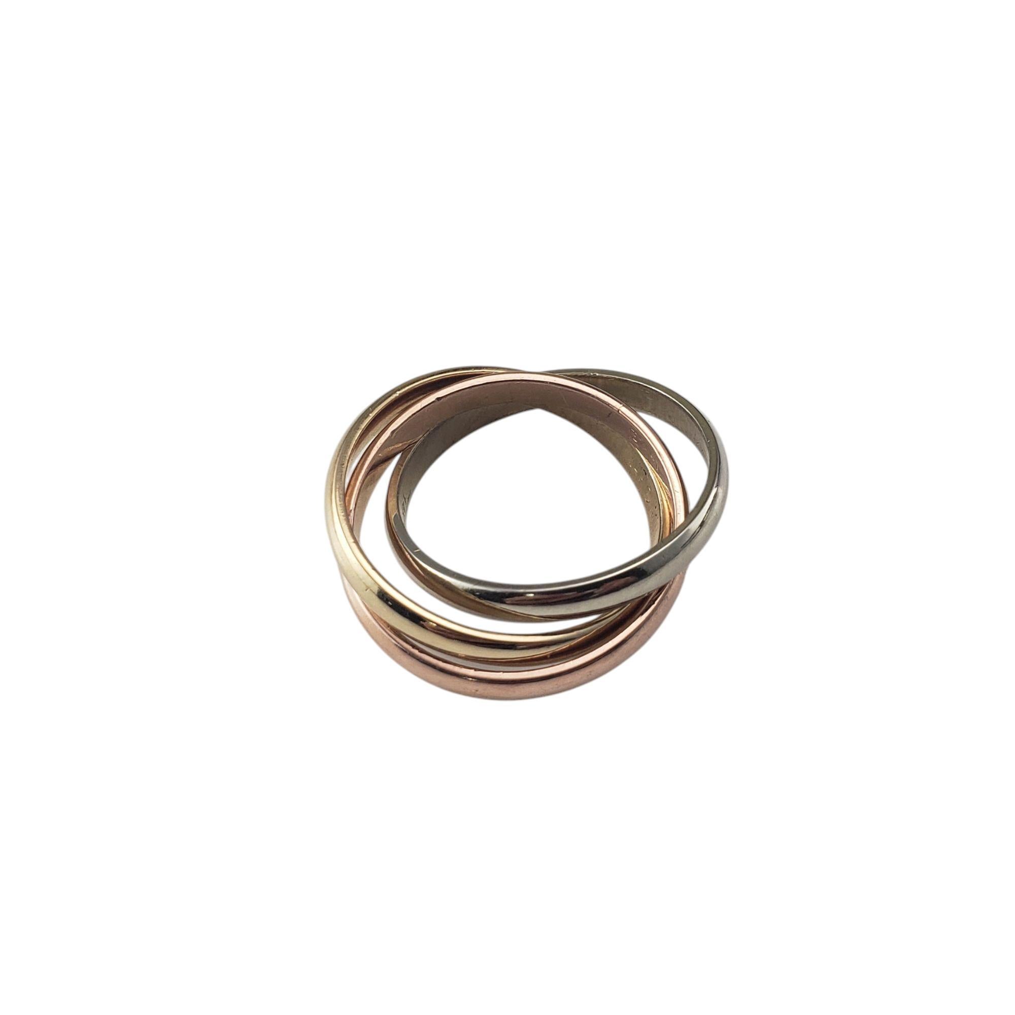 14K Tricolor Gold Rolling Trinity Ring Size 8.25

This timeless piece features three interlocking bands crafted from 14K yellow, white and rose gold and create a seamless rolling motion when worn. This elegant design is often associated with love,