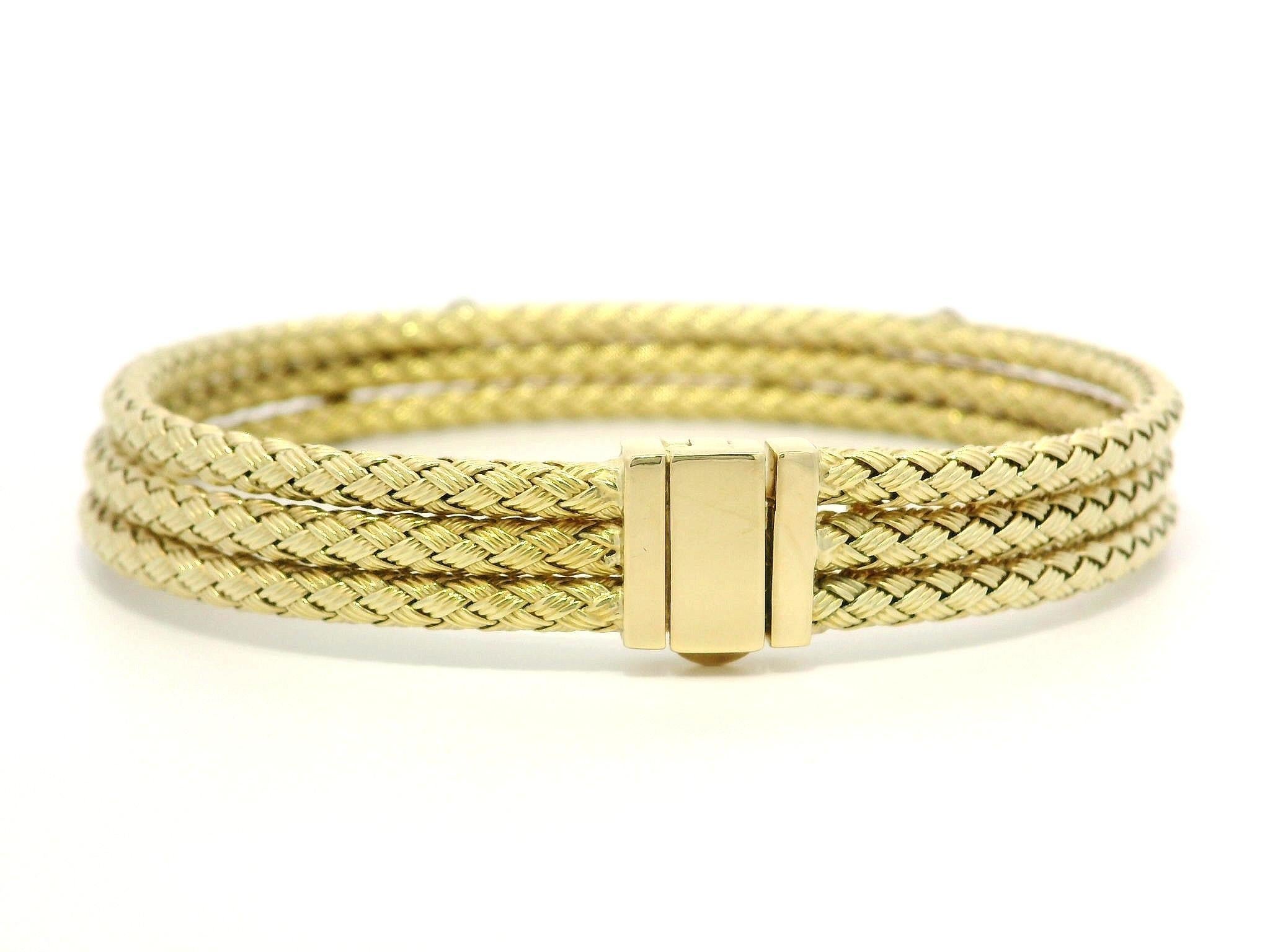 -- Stone(s) --
(5) Natural Genuine Diamonds - Round Brilliant Cut - Bezel Set - Nice Brilliant White Color 
Total Carat Weight: 0.20ctw (approx.)

Material: 14K Solid Yellow Gold w/ White Gold Accents
Weight: 17.19 Grams
Chain Type: 3 Stack Woven