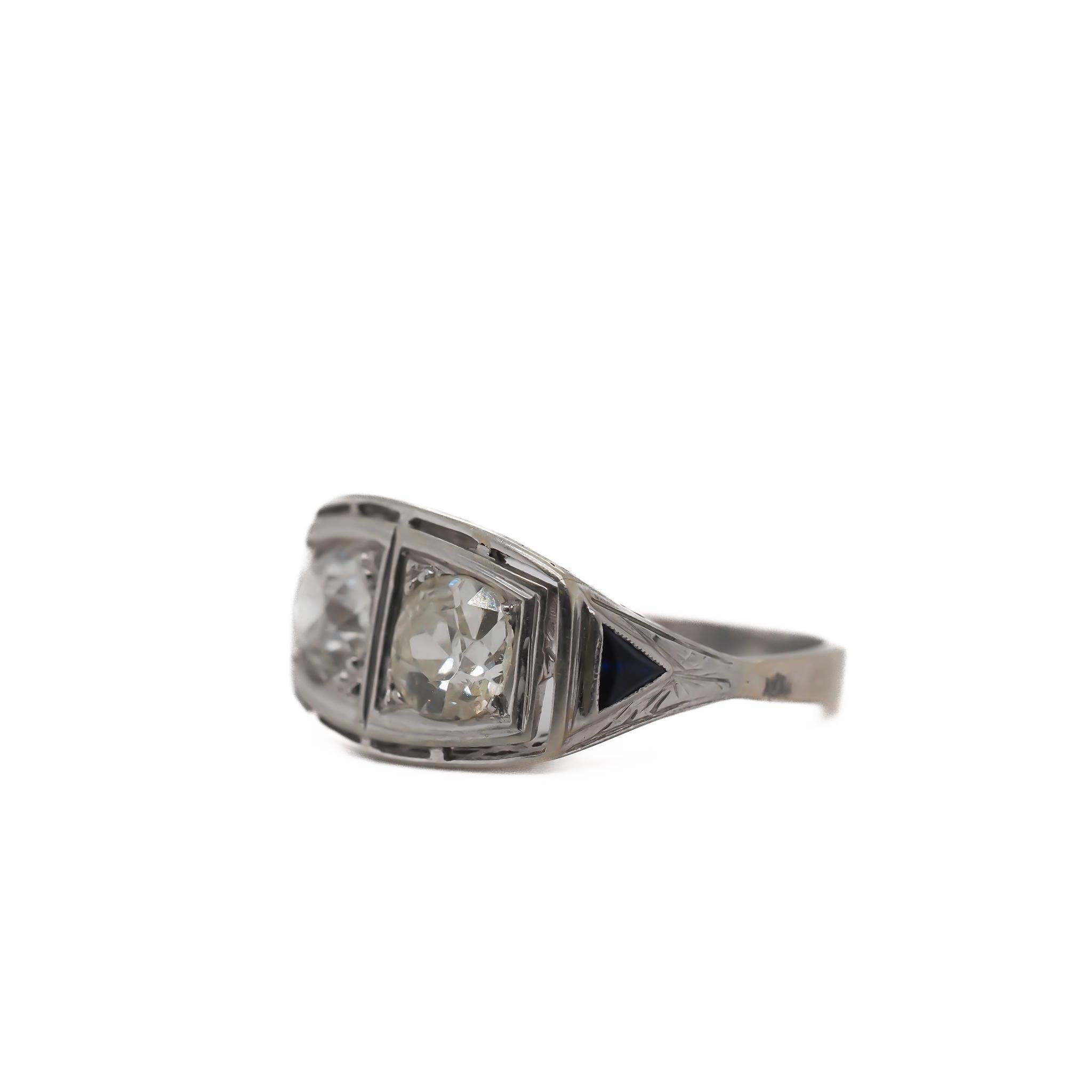 Diamond Details

Diamond 1:
Cut: Old Miner Cut
Size: .60 (Approximate)
Color: I
Clarity: SI1

Diamond 2:
Cut: Old Miner Cut
Size: .60ct (Approximate)
Color: K
Clarity: SI1

Finger to Top of Stone Measurement: 5.56mm