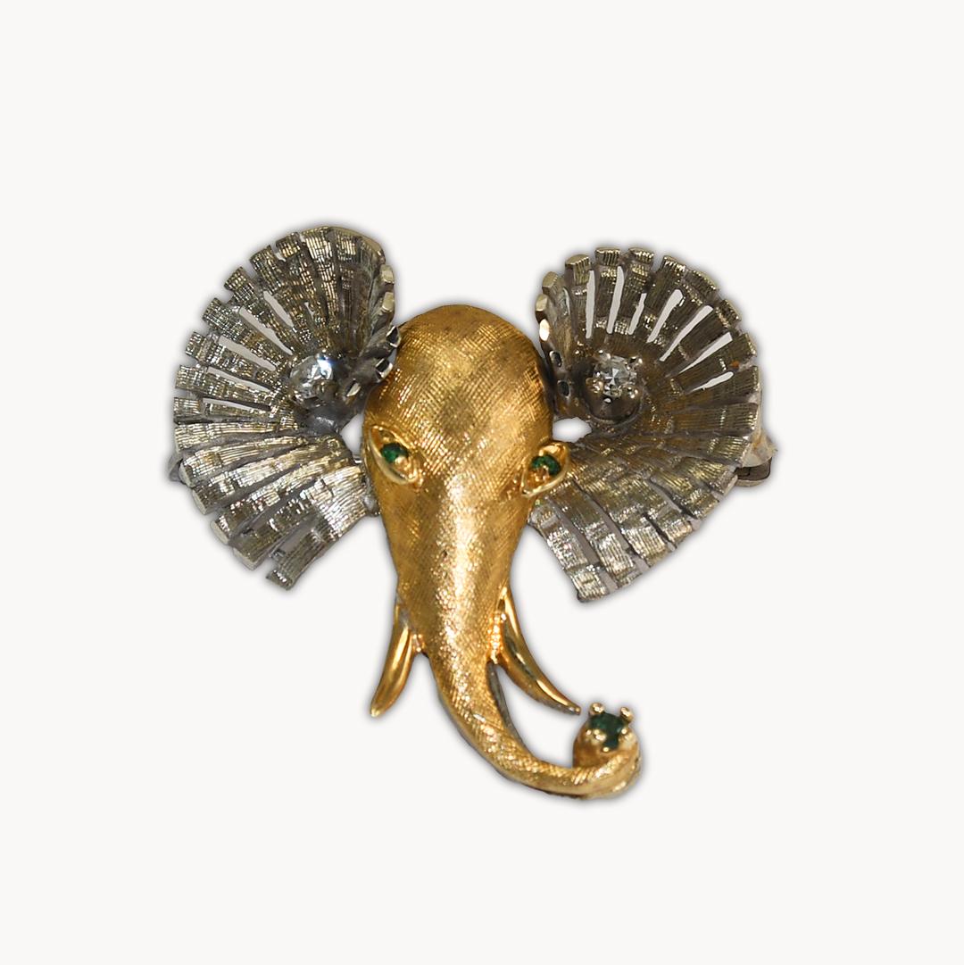 14k white and yellow gold elephant brooch.
Stamped 14k and weighs 5.7 grams.
There are small accent diamonds in the ears.
The surfaces of the brooch have an attractive textured finish.
The dimensions are one inch by one inch.
Excellent condition.