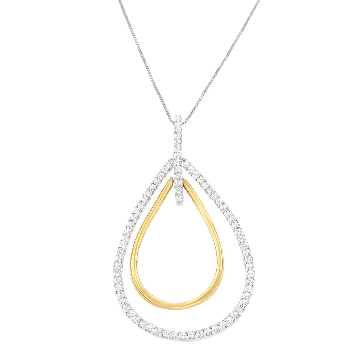 Classic meets contemporary for a chic contrast! This eye-catching pendant flaunts an outer burst of white gold, which sparkles with one carat of round diamonds. An inner burst of yellow gold completes the look for impeccable style. This beautiful
