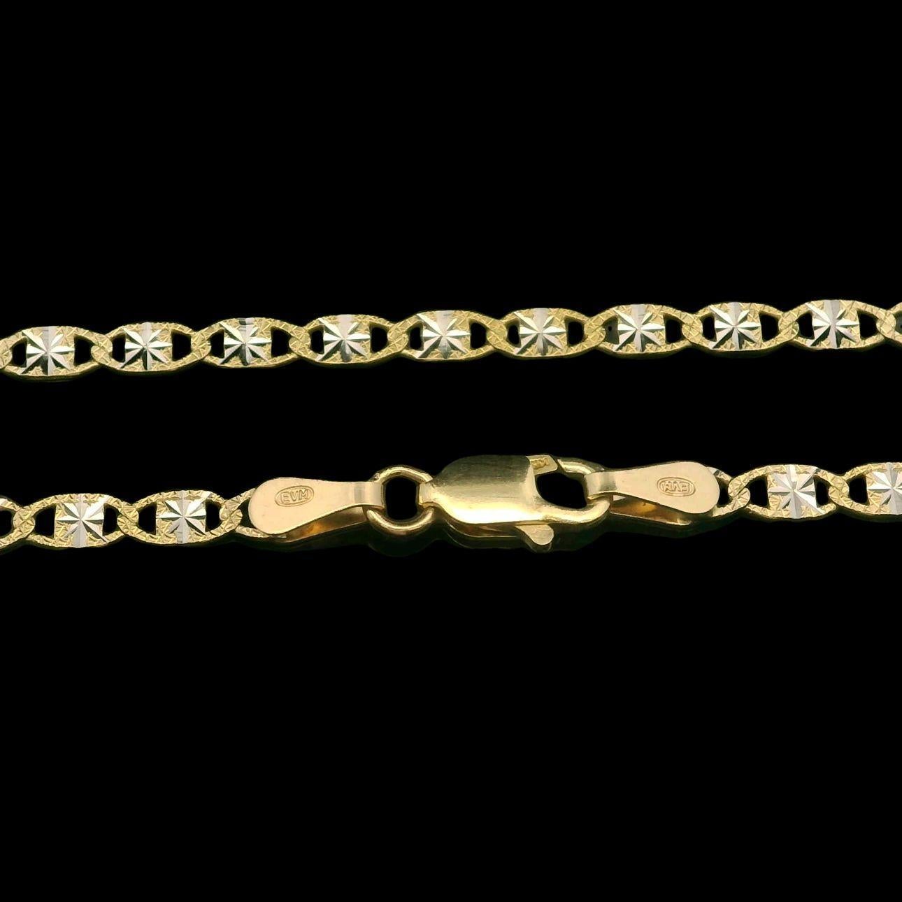 MATERIAL : Or jaune et blanc 14k massif
Poids : 4.87 grammes
Type de chaîne : Chaîne à maillons plats
Longueur de la chaîne : 22 pouces
Largeur de la chaîne : 2,5 mm
Épaisseur de la chaîne : 0.4mm
Fermoir : Griffe de homard
Condit : Finition et