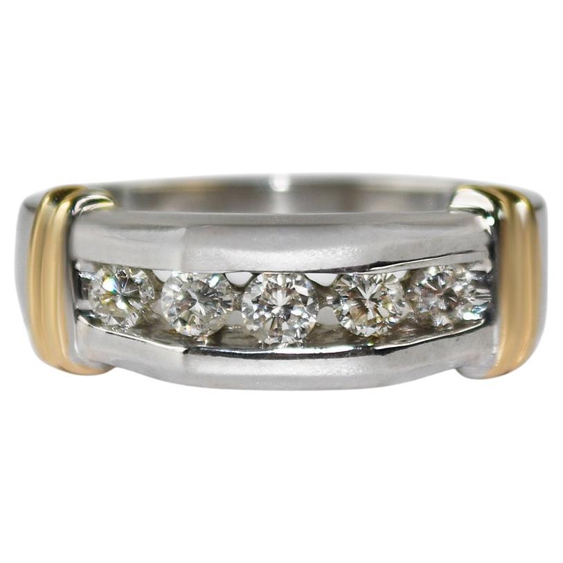 Fede nuziale in oro 14K bicolore con diamante 0,50ct