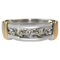 Fede nuziale in oro 14K bicolore con diamante 0,50ct