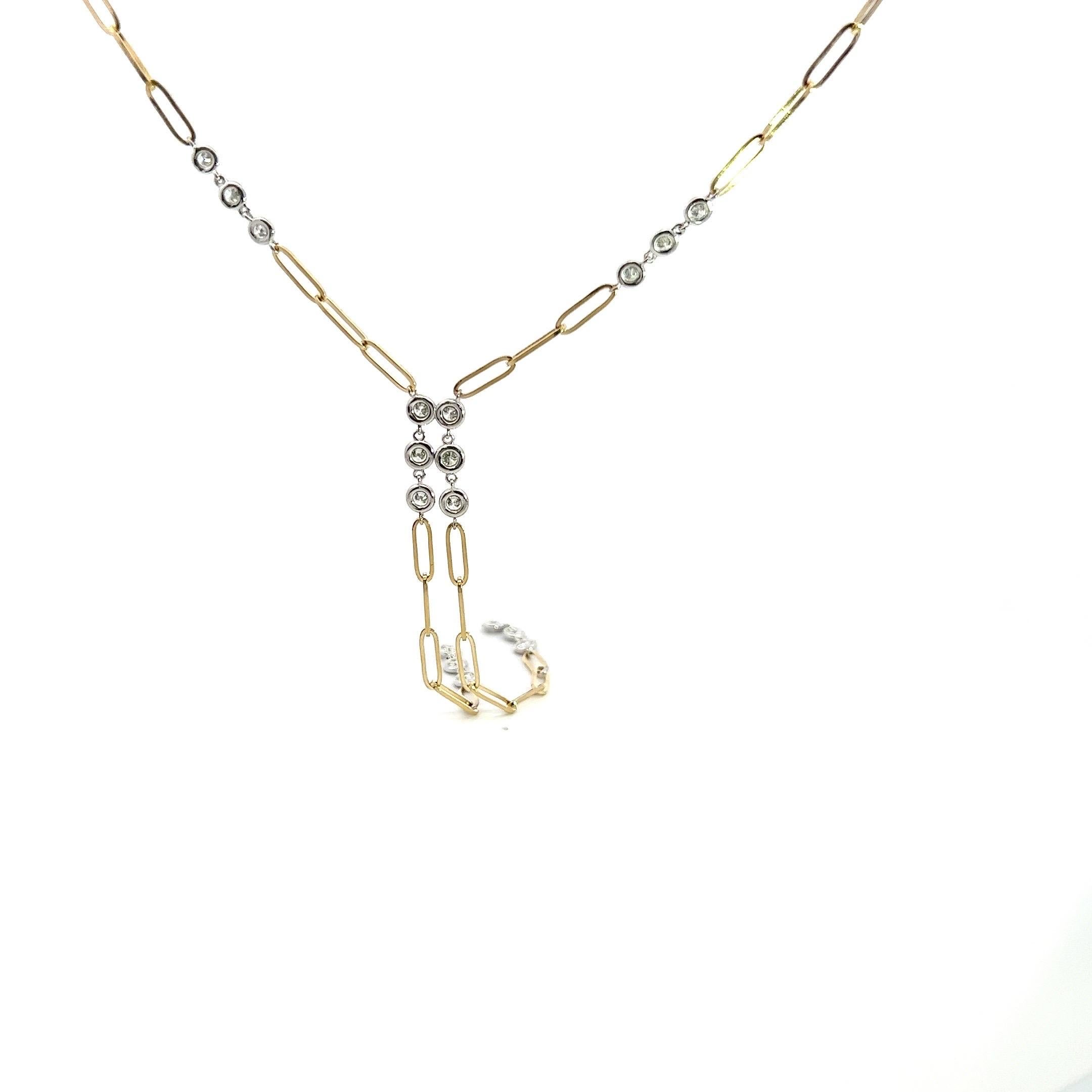 Indulge in the epitome of elegance with this exquisite Diamonds-by-the-Yard and Paper Clip Chain Gold Necklace, a harmonious fusion of opulence and modernity. Crafted in 14k yellow and white gold, this versatile piece exudes a timeless charm that
